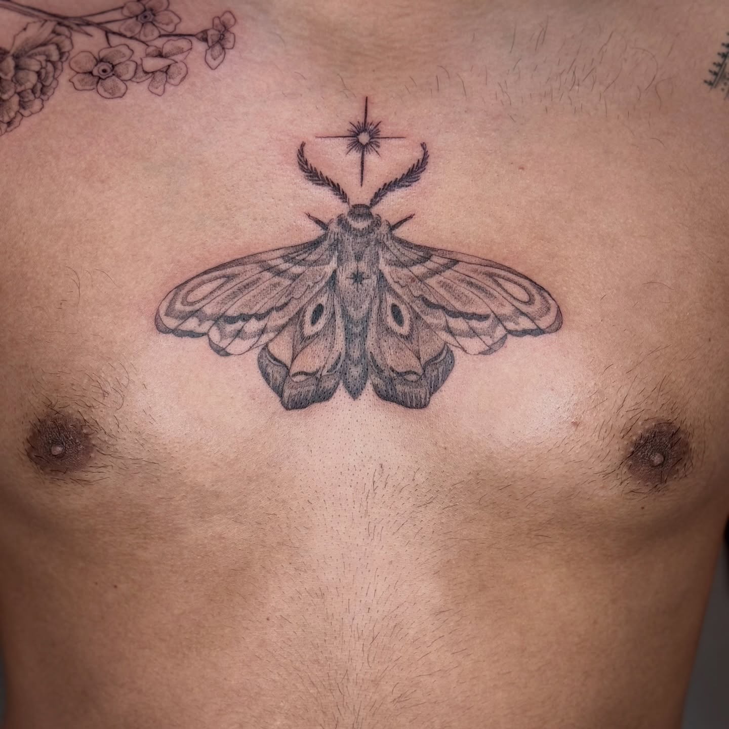 Moth black and grey tattoo on the chest by ❁ Marlo Marquise Tattoo Artist ❁