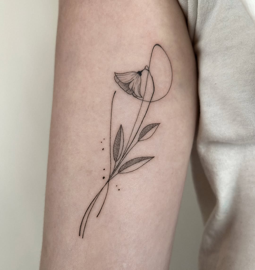 Flower stem fine line tattoo on the forearm by Helly March
