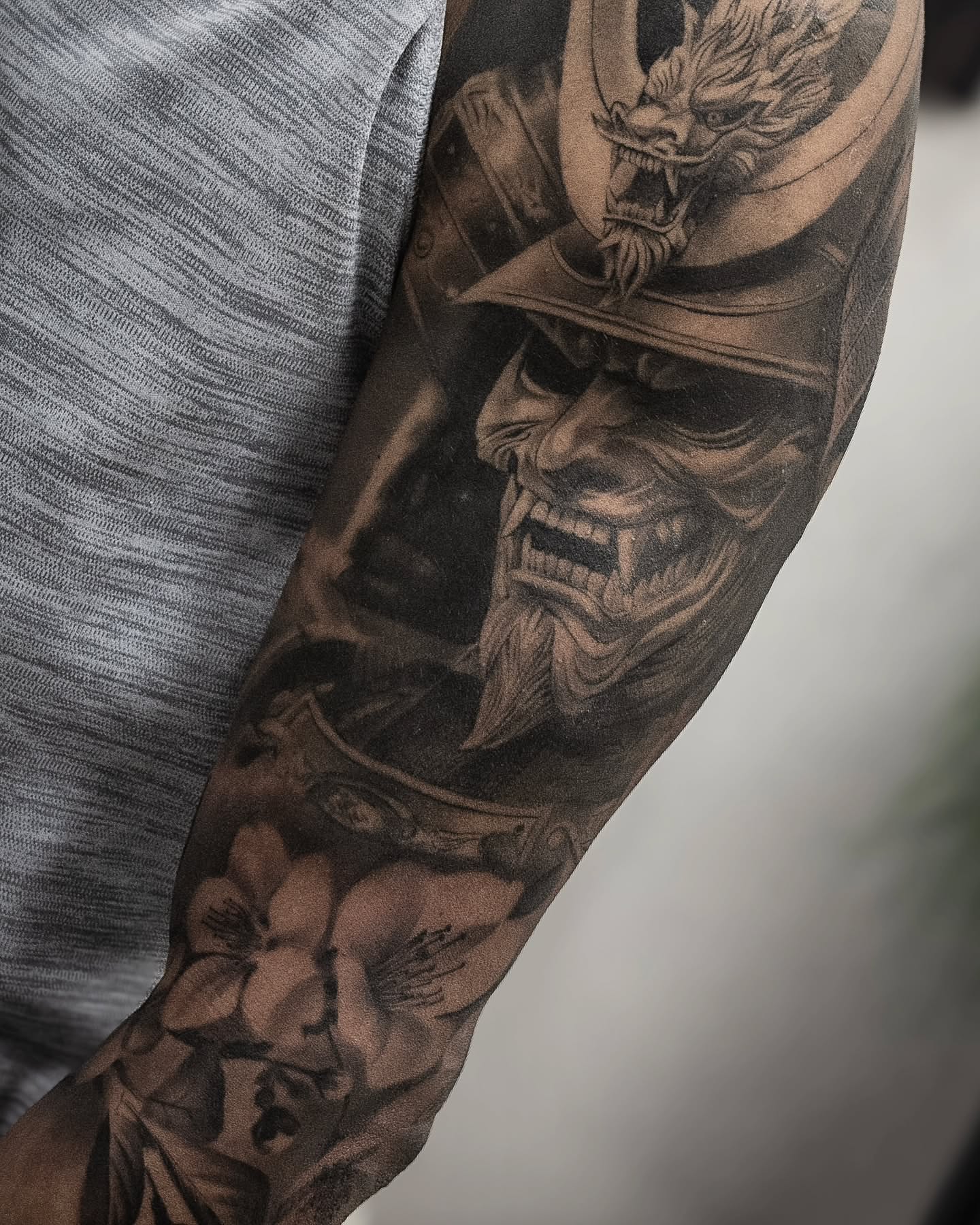 Samurai mask realism tattoo on the forearm by Erik Bonilla