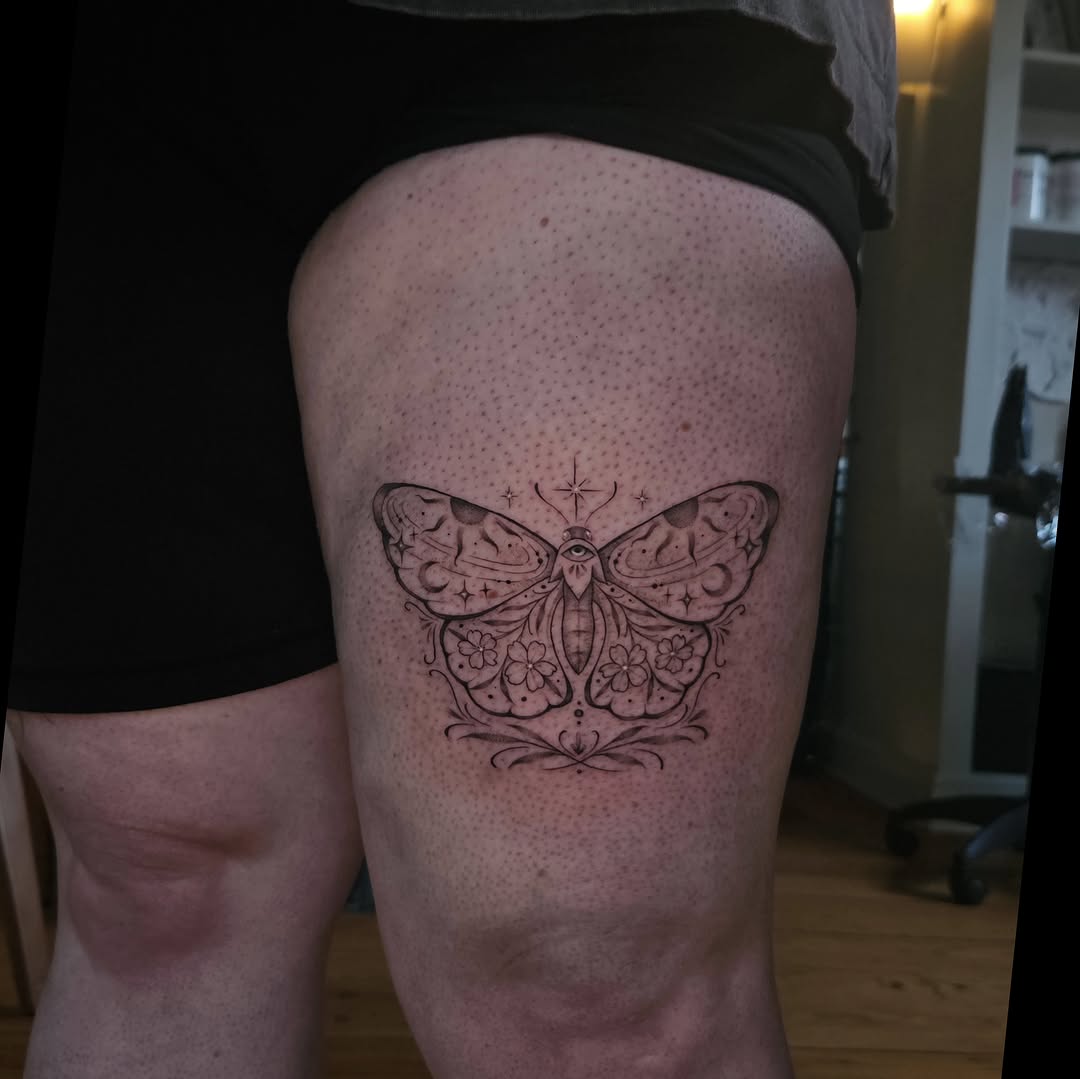 Butterfly dotwork tattoo on the thigh by Courtlyn Bliss