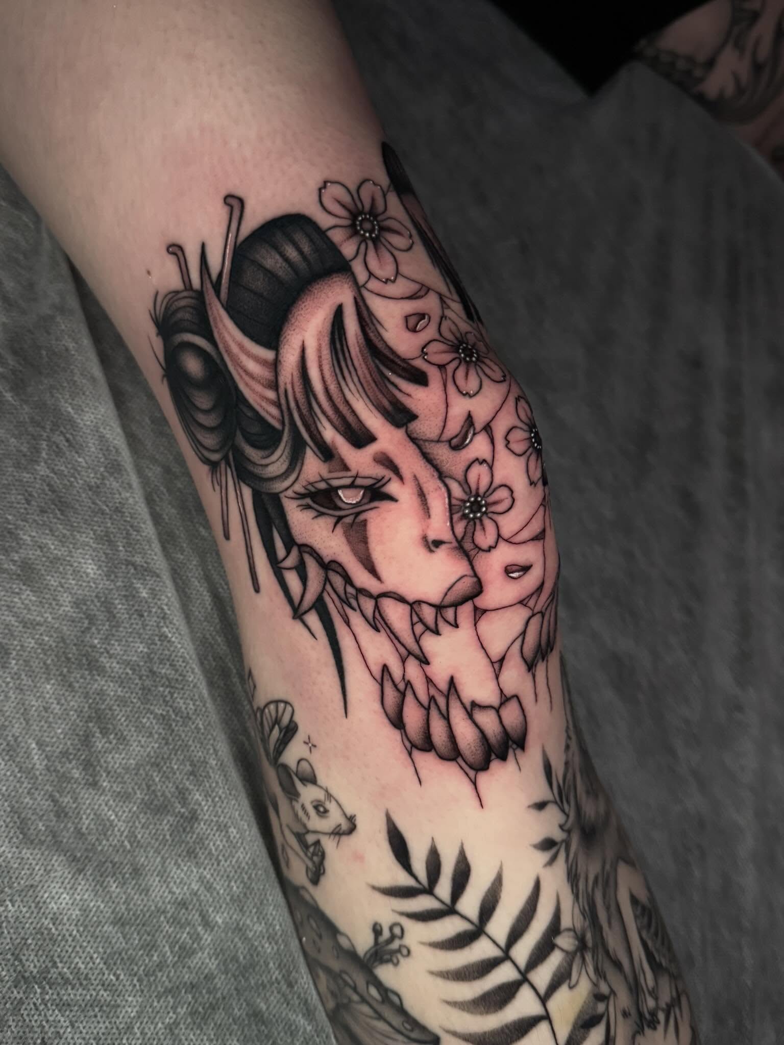 Geisha realism tattoo on the forearm by kelsey hackett