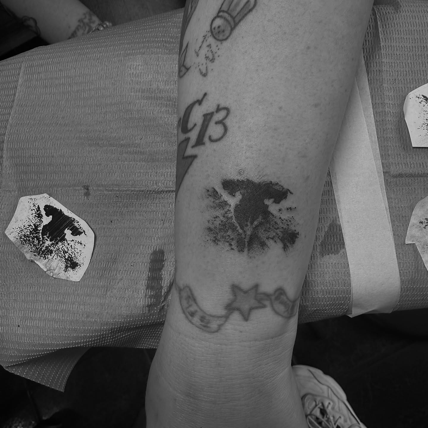 Abstract shape dotwork tattoo on the forearm by Devin Derbes