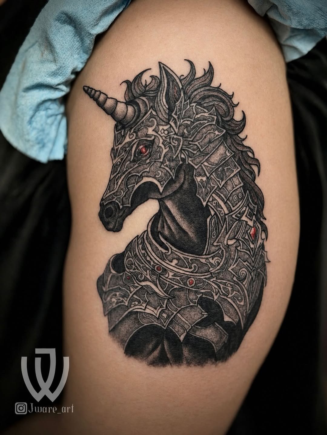 Armored unicorn head realism tattoo on the shoulder by Joshua Ware, Alvarado, Texas