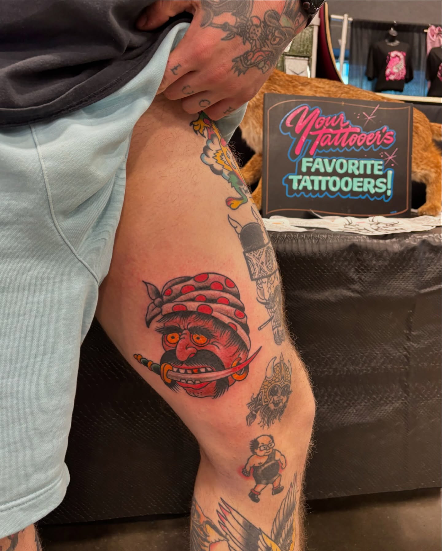 Pirate head trash polka tattoo on the thigh by Cody Wallenius, Merrillville, Indiana