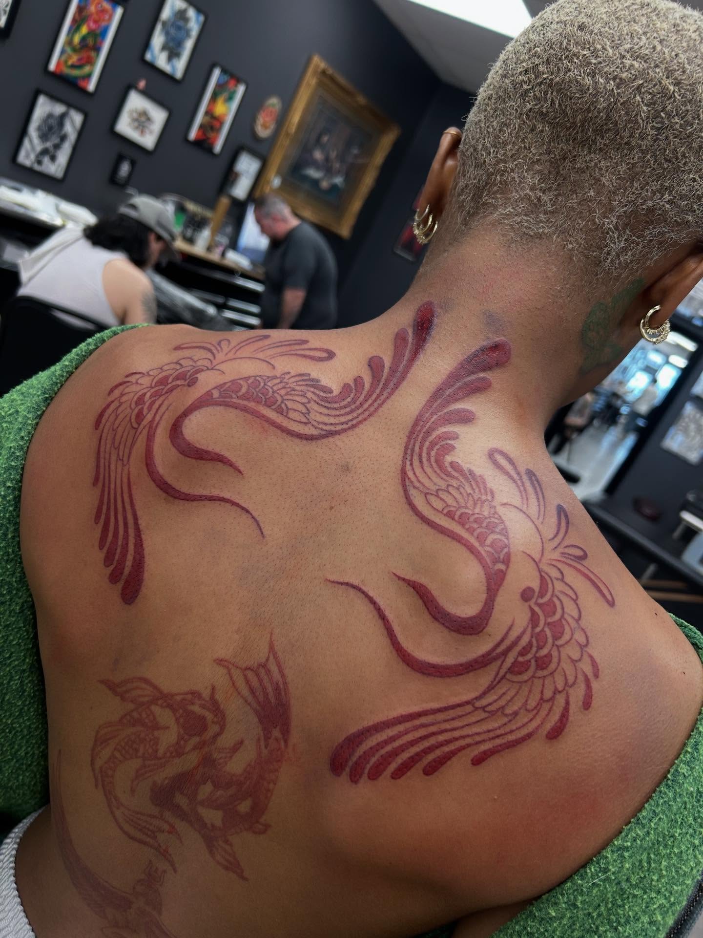 Phoenix American traditional tattoo on the back by Livy baby