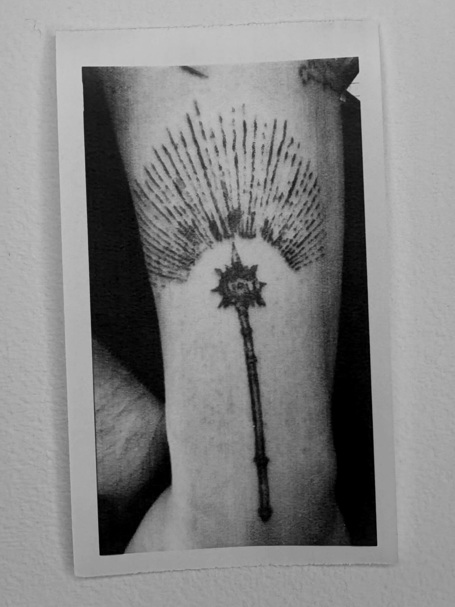 Key with radiating lines dotwork tattoo on the forearm by @lil_stinker_5000, Portland, Oregon