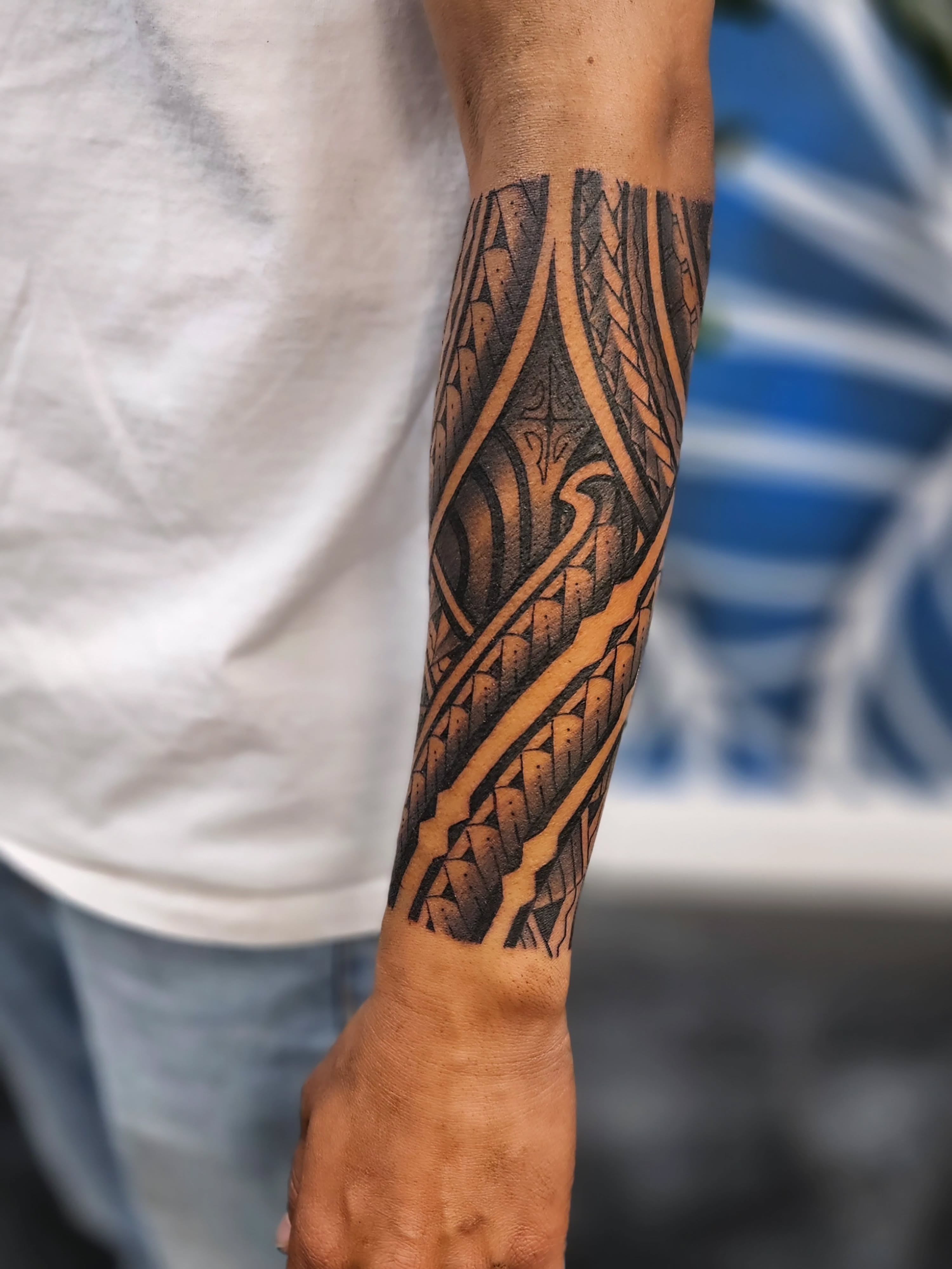 Tribal pattern tribal tattoo on the forearm by Jo'el Acoba