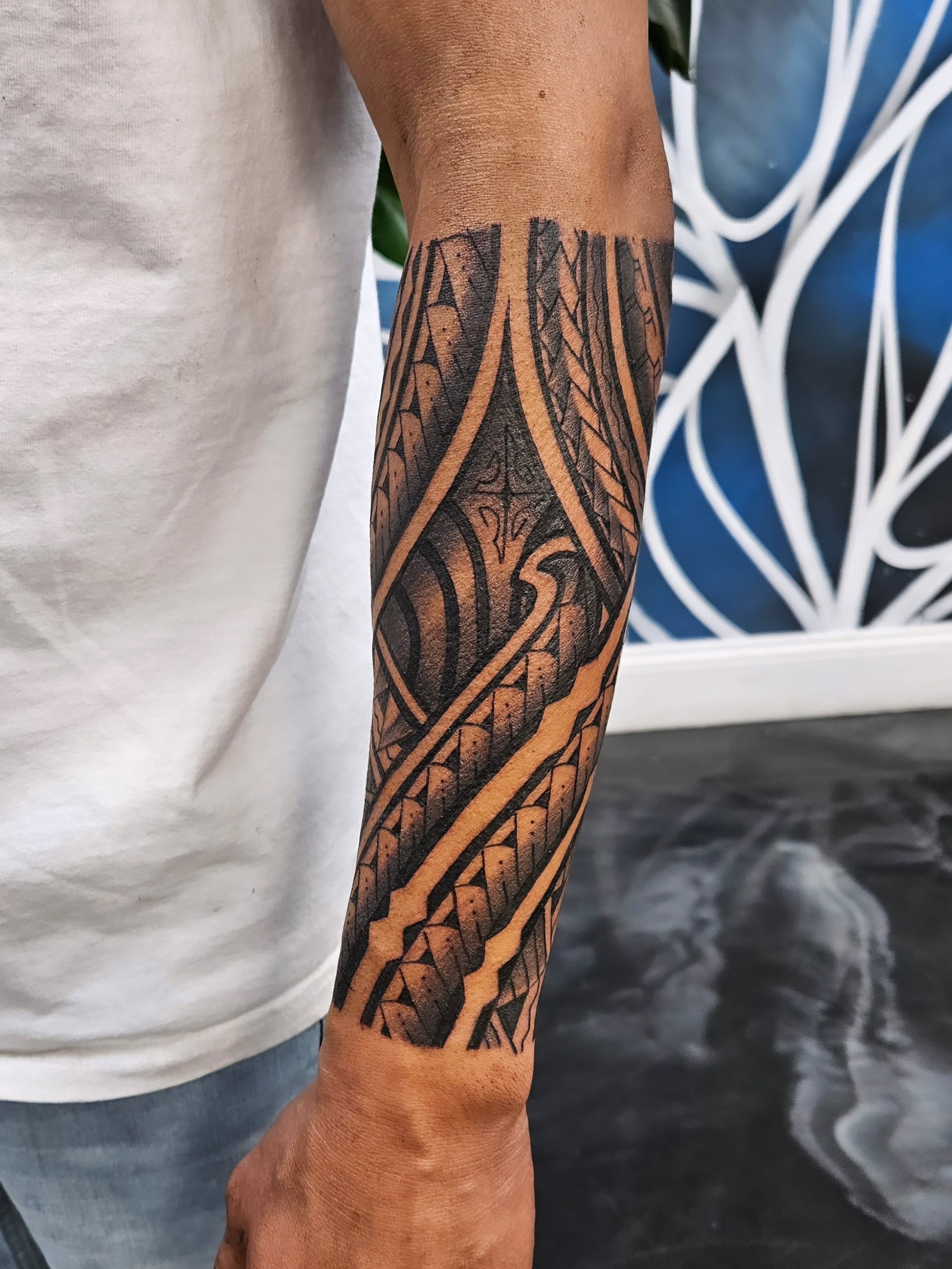 Tribal pattern tribal tattoo on the forearm by Jo'el Acoba