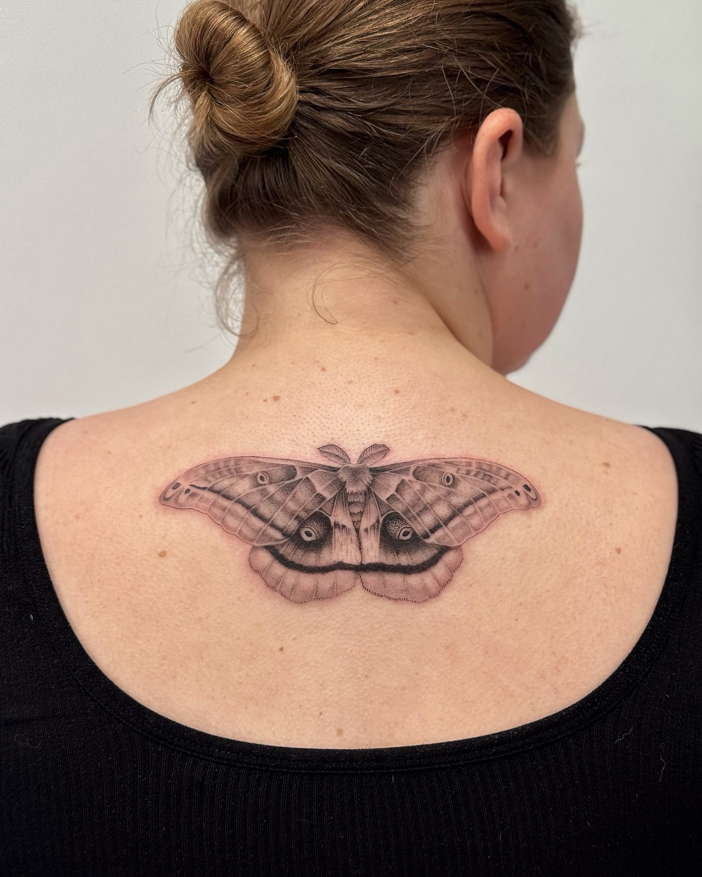 Butterfly realism tattoo on the back by Lea Burkard, Berkeley, California