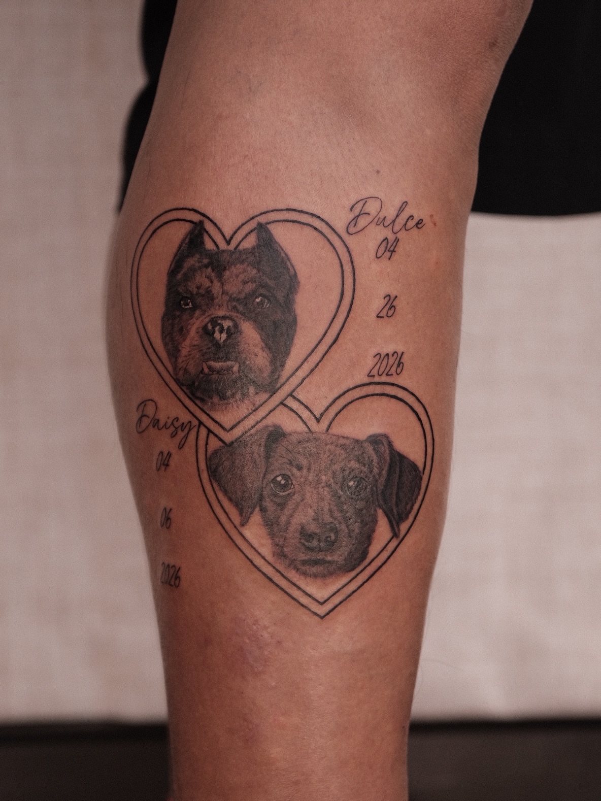 Dogs realism tattoo on the forearm by Houston Tattoo Artist GoldenK
