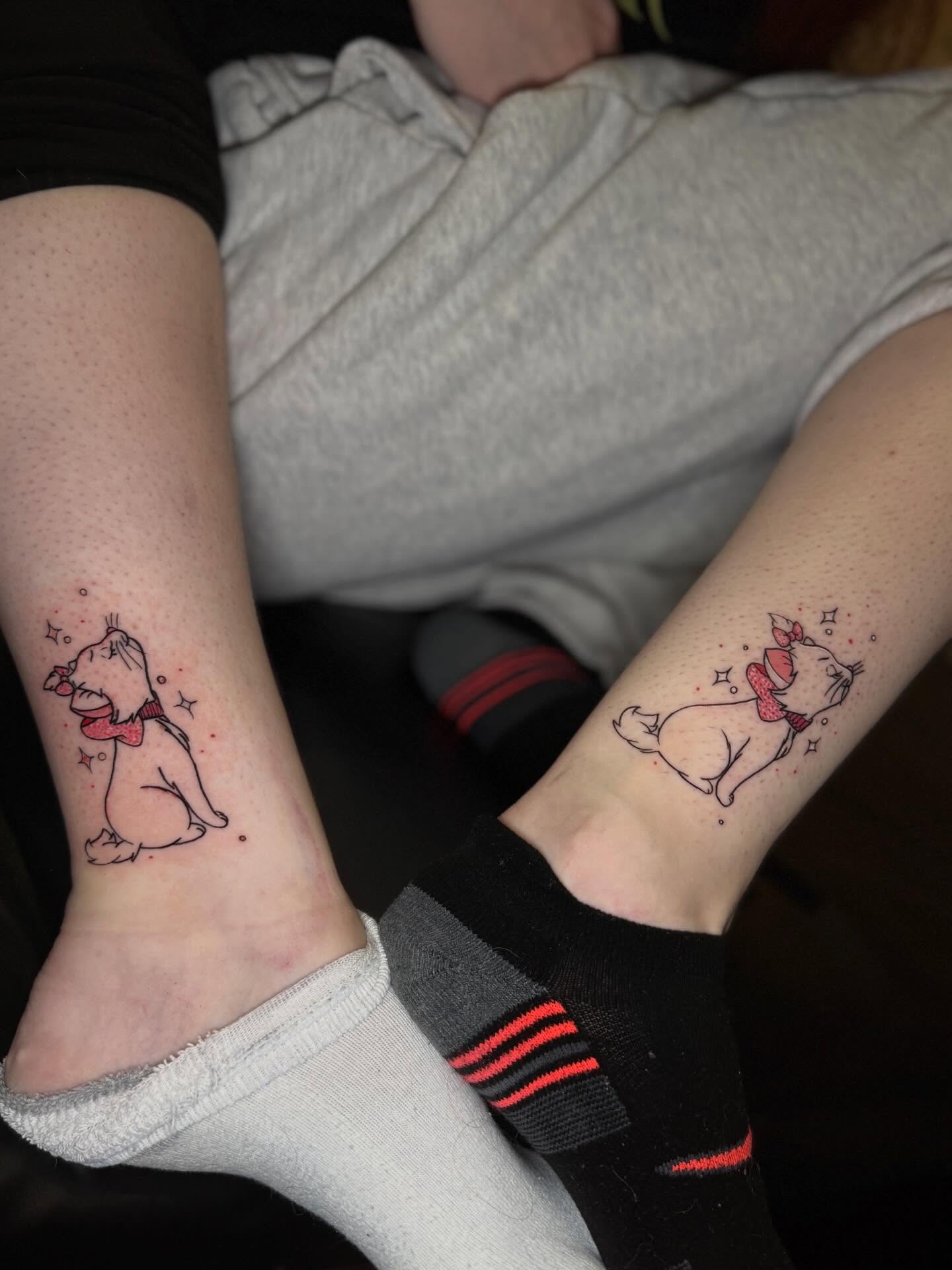Dog dotwork tattoo on the foot by Saint