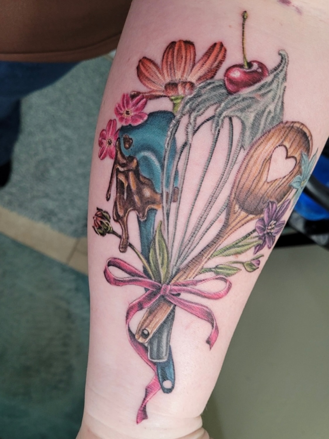 Bouquet realism tattoo on the forearm by Brittany Whitaker