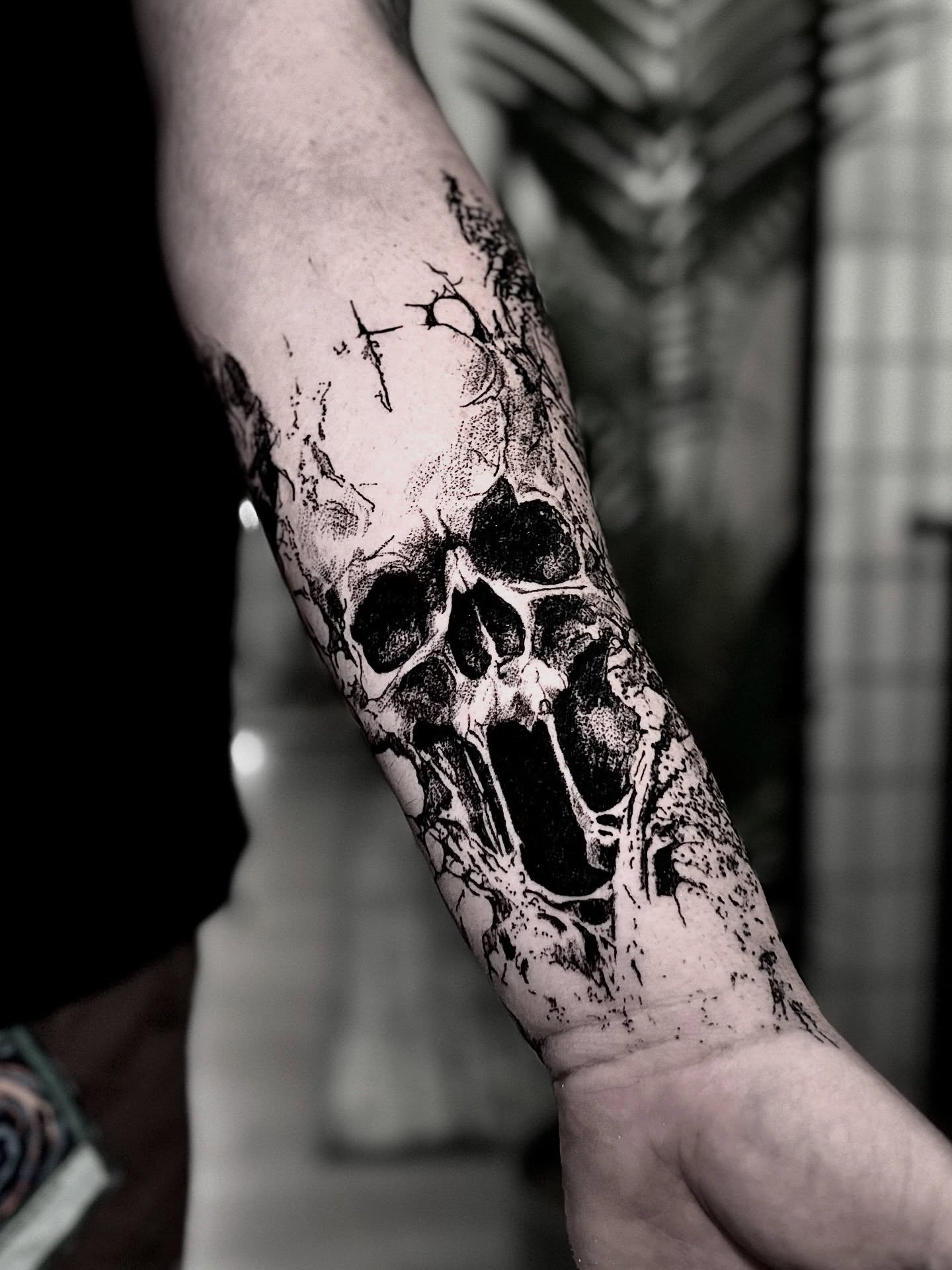 Skull dotwork tattoo on the forearm by Bwk Dark Art
