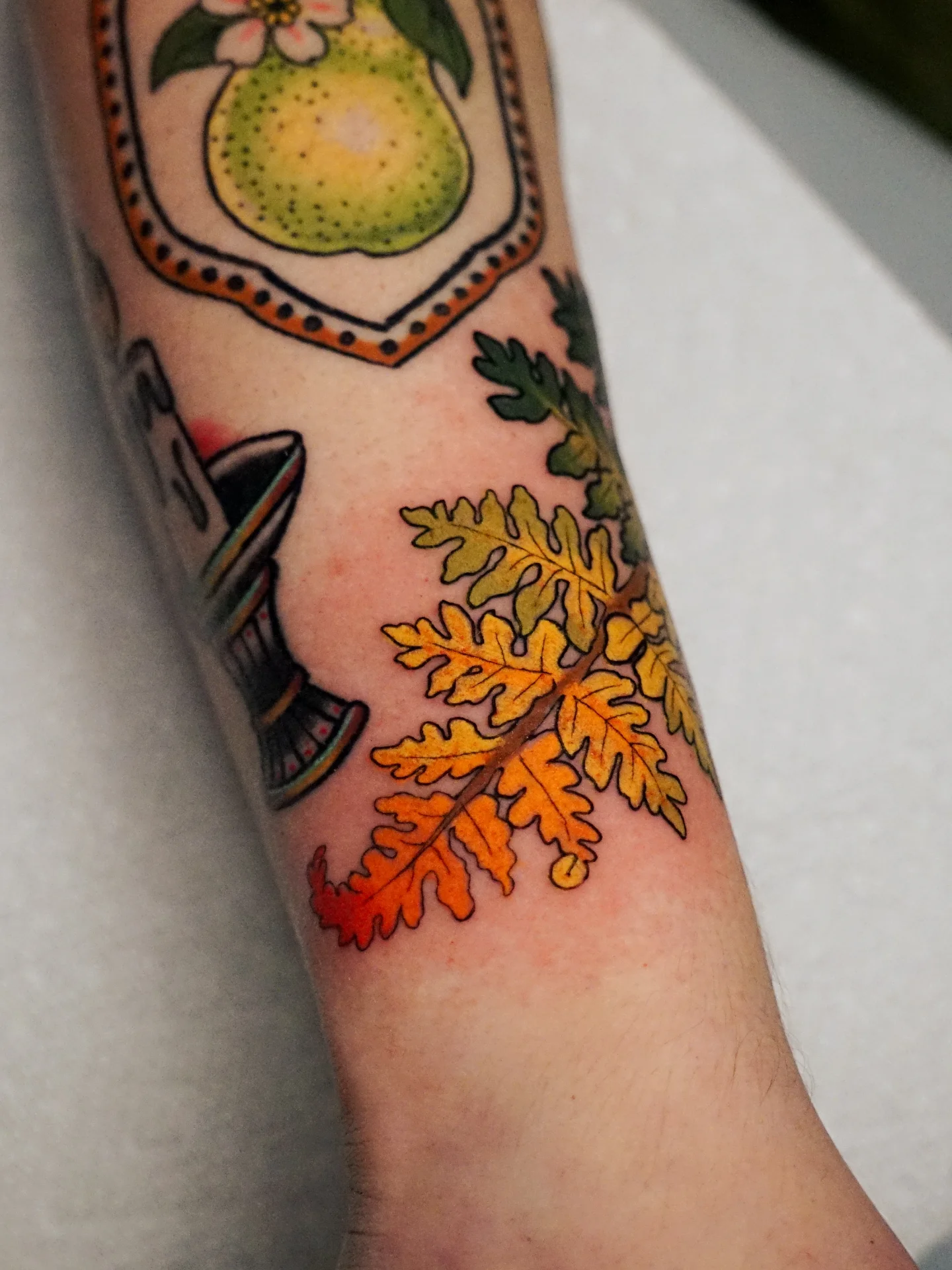 Fall leaves American traditional tattoo on the forearm by kylie, San Antonio, Texas