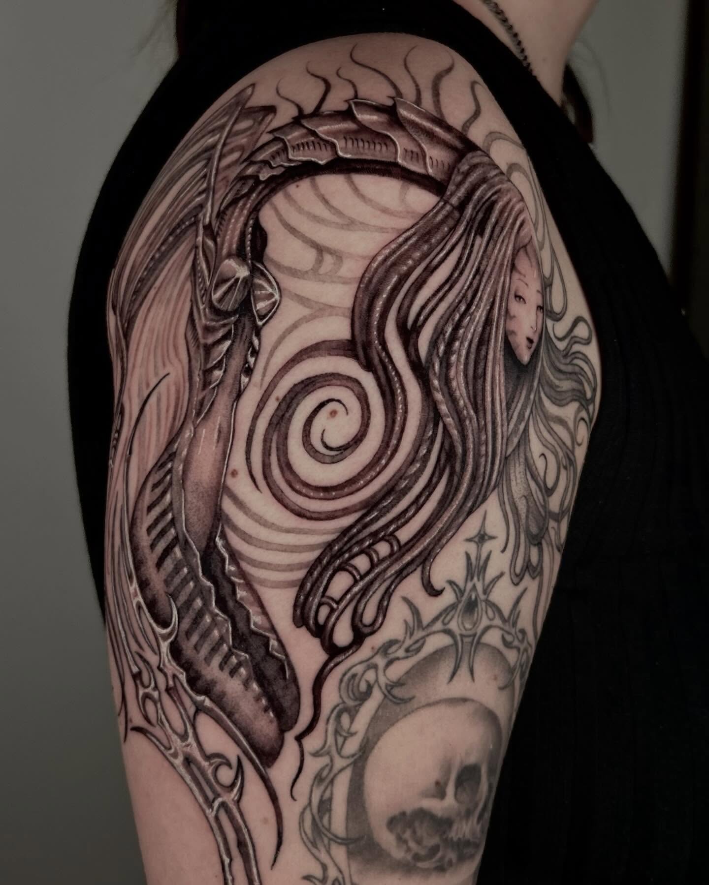 Spiraling woman realism tattoo on the shoulder by 𝔅𝔢𝔩𝔩𝔞