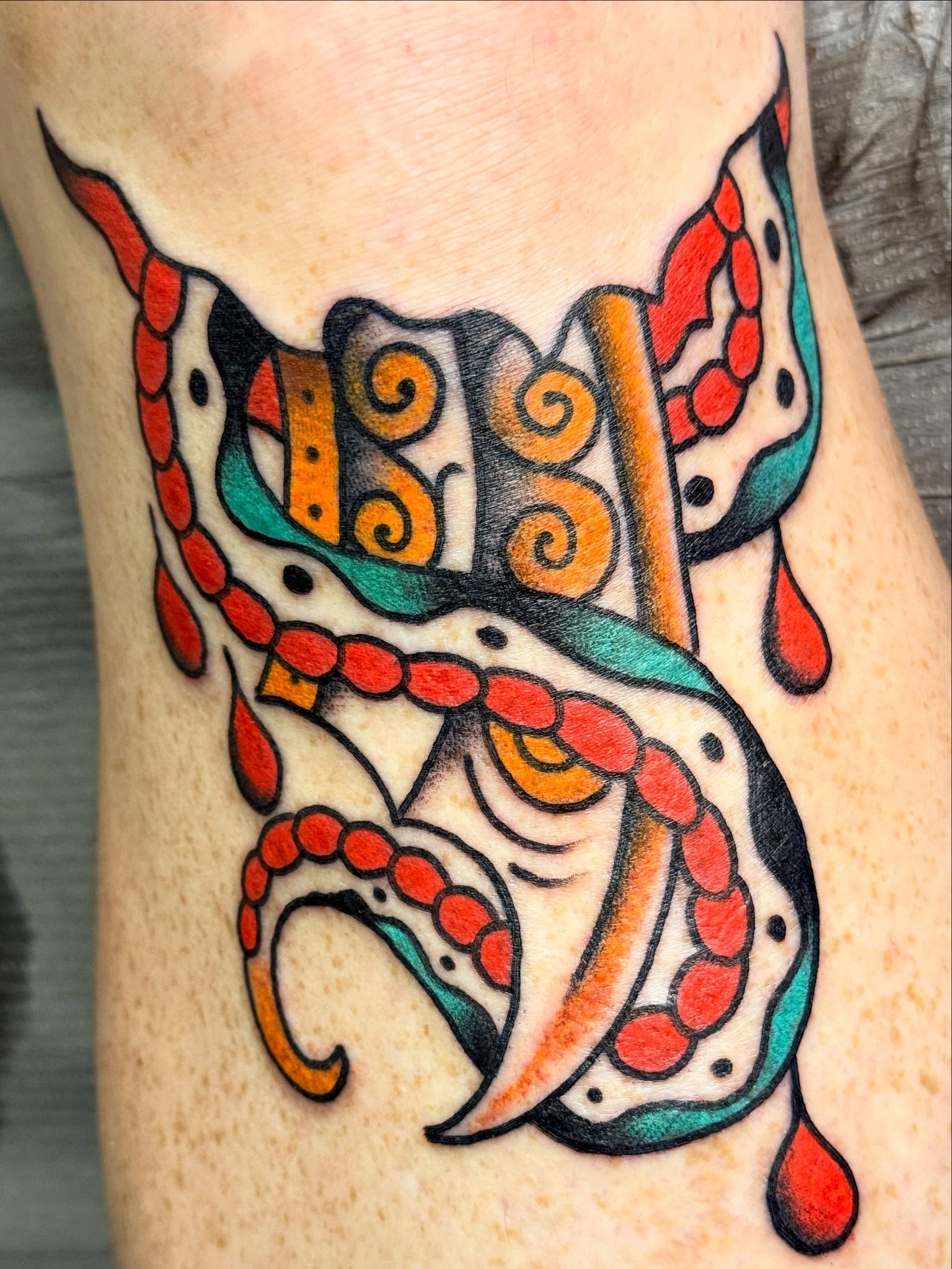 Octopus American traditional tattoo on the forearm by 🕸curtis Fink🕸