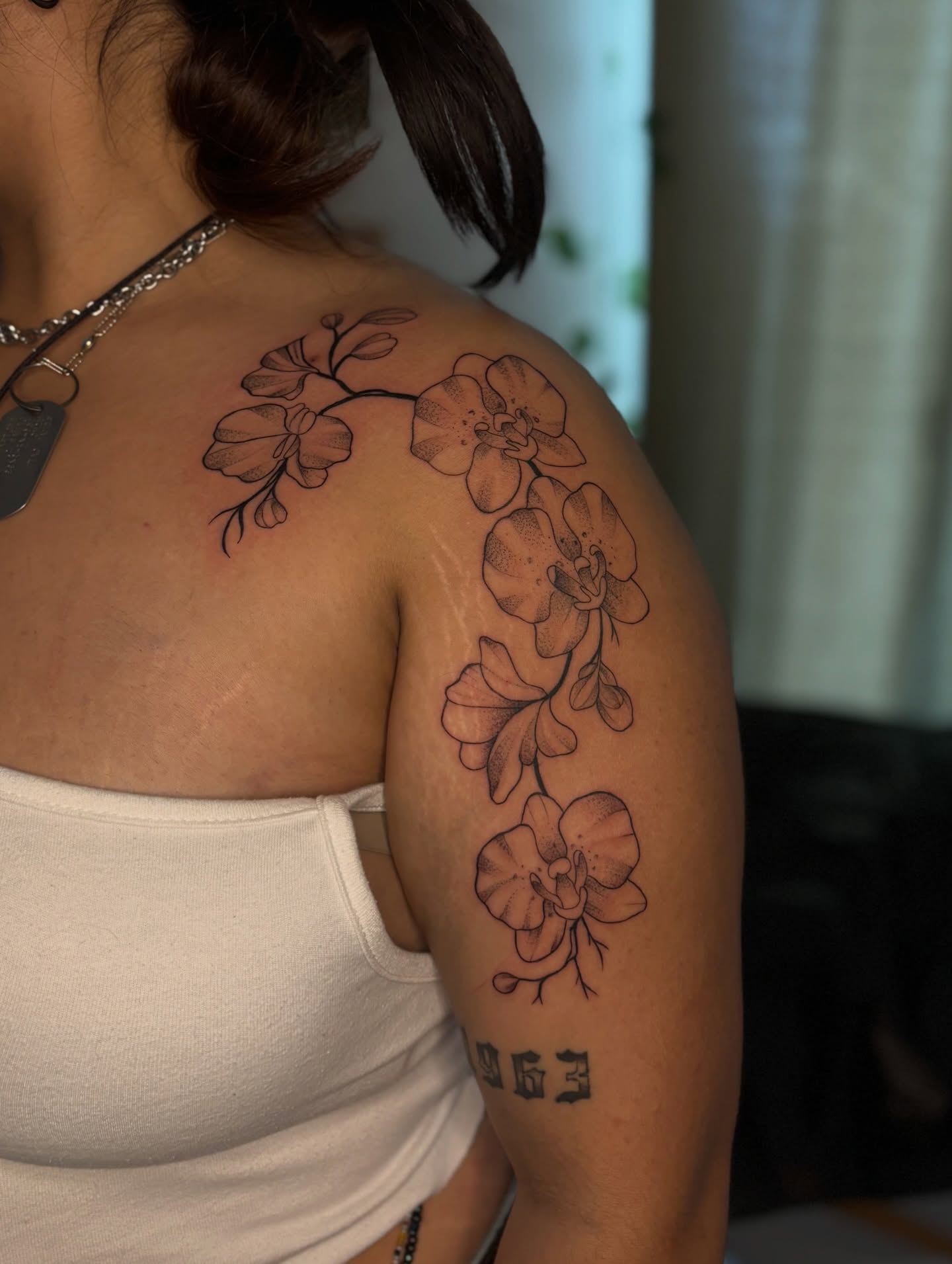 Orchid black and grey tattoo on the shoulder by the ink witch ๐ฎ๐ค๐