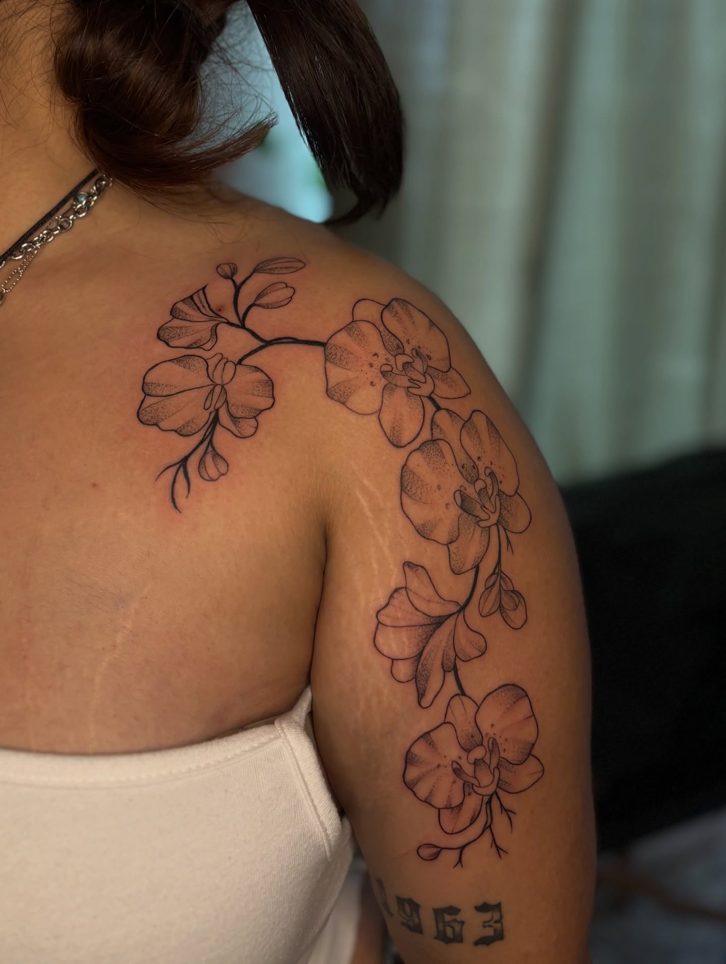 Orchid dotwork tattoo on the shoulder by the ink witch ๐ฎ๐ค๐