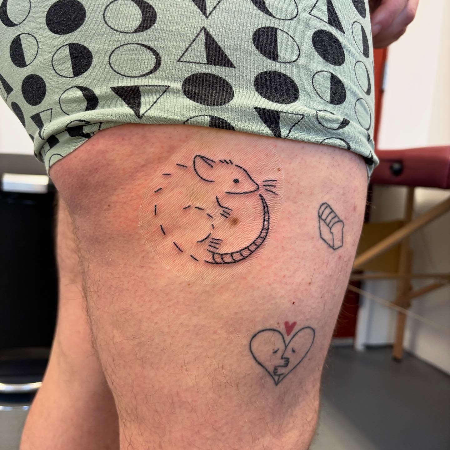 Mouse and heart geometric tattoo on the thigh by ☠️mikauley☠️