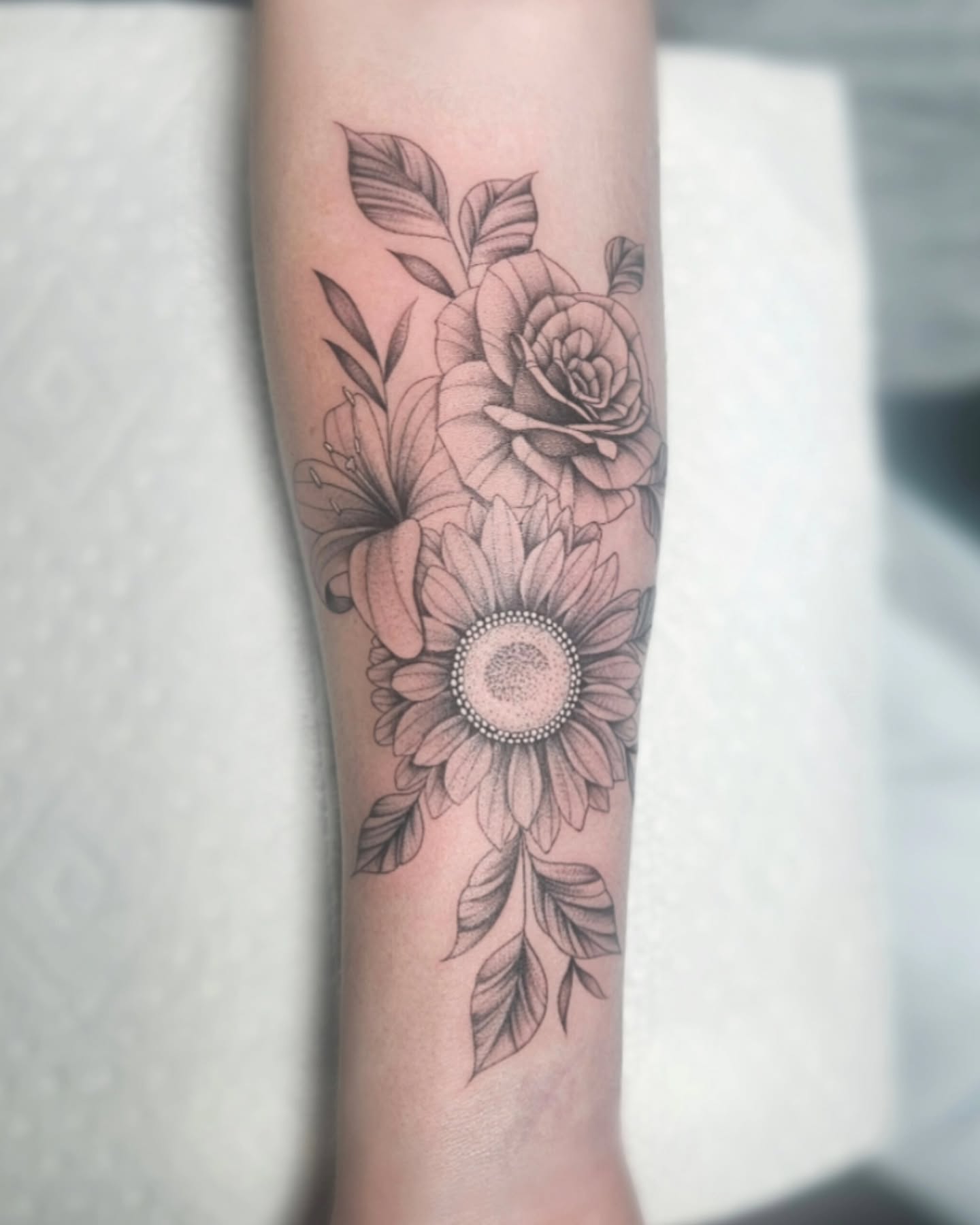 Sunflower and roses dotwork tattoo on the forearm by TaylorLeighShermanTattoos OFFICIAL
