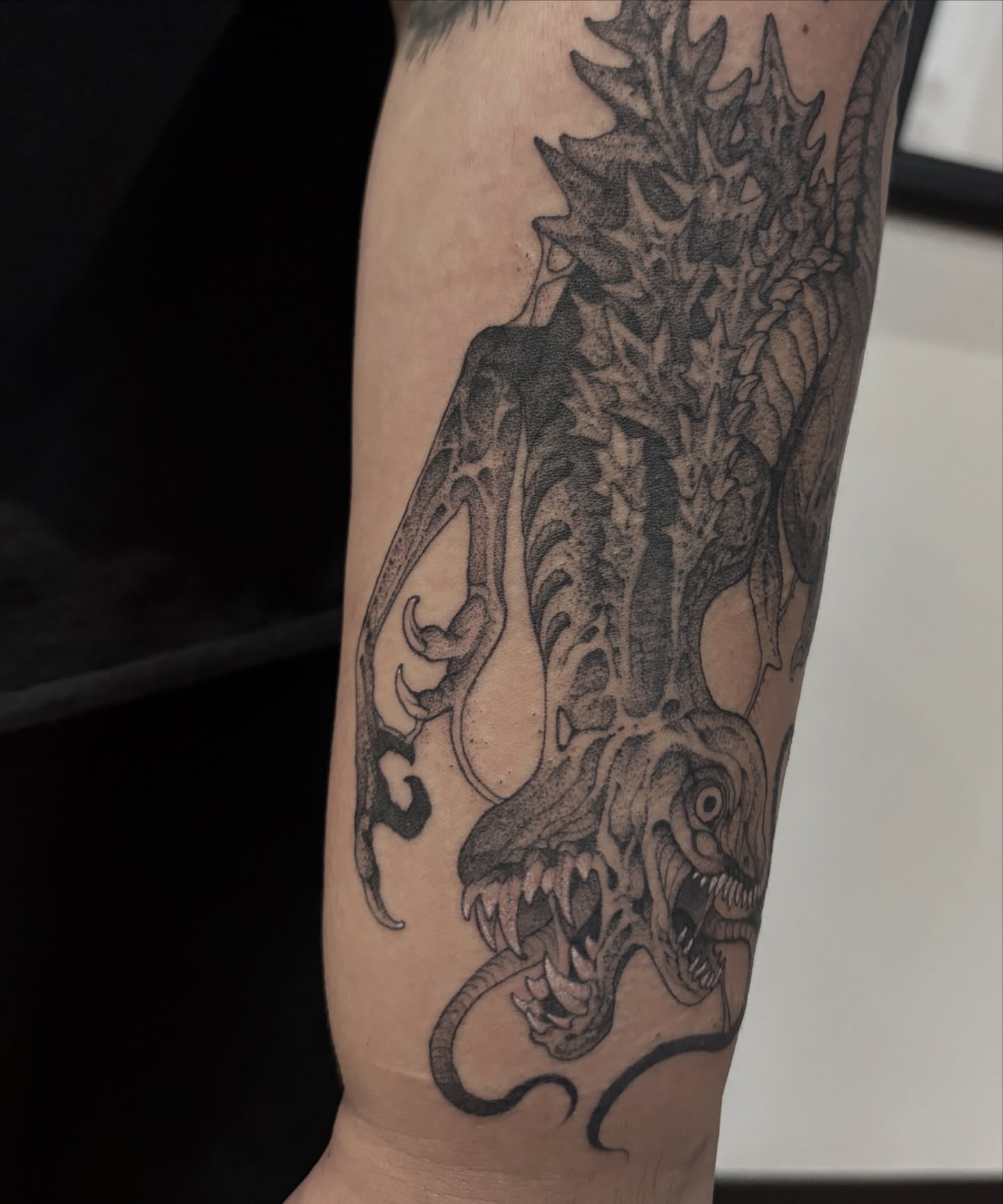 Dragon realism tattoo on the forearm by Becci Chelicerata