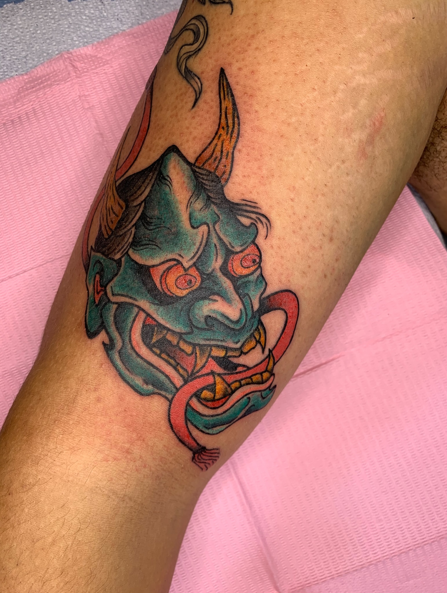 Demon mask japanese irezumi tattoo on the forearm by Aubrianna Grisez