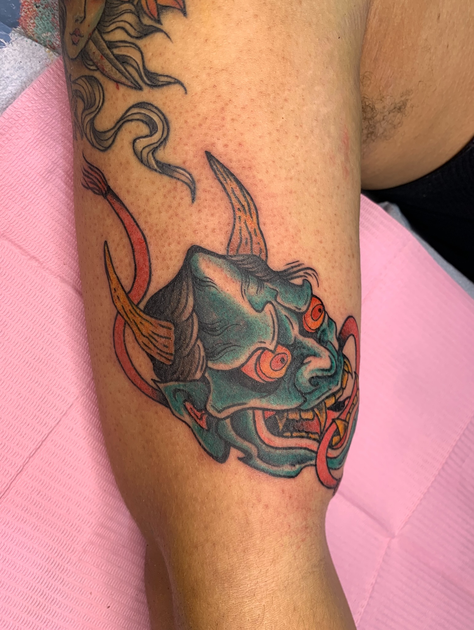 Demon head japanese irezumi tattoo on the forearm by Aubrianna Grisez
