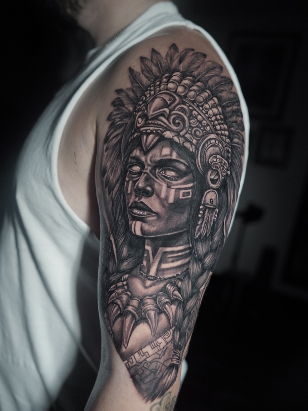 Indigenous woman realism tattoo on the shoulder by Niko Hosk Cataldo