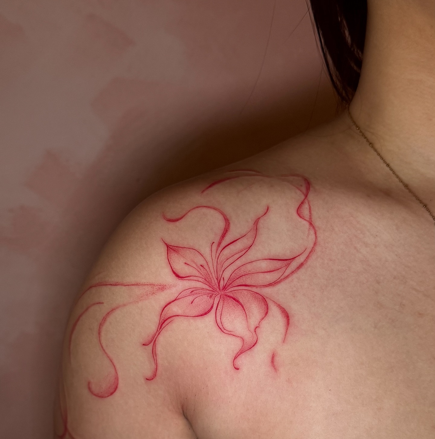 Lily fine line tattoo on the shoulder by fine line tattoo artist▪️Austin TX