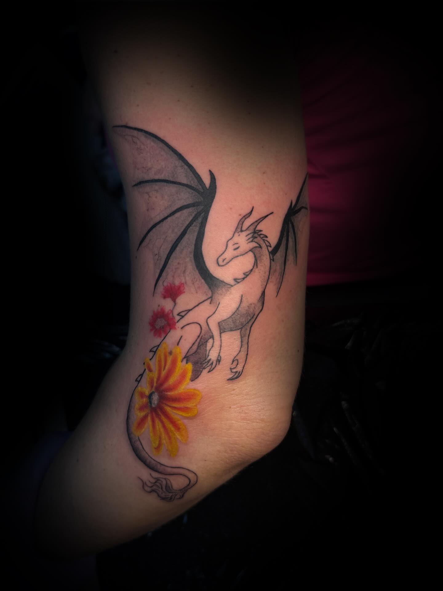 Dragon with flowers dotwork tattoo on the forearm by sᴋᴇᴛᴄʜᴇᴅ