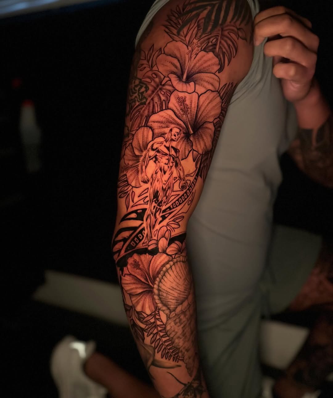 Surfer with tropical flowers and shell tribal tattoo on the forearm by Jackyyyyyy - Tattoo Artist 🖤