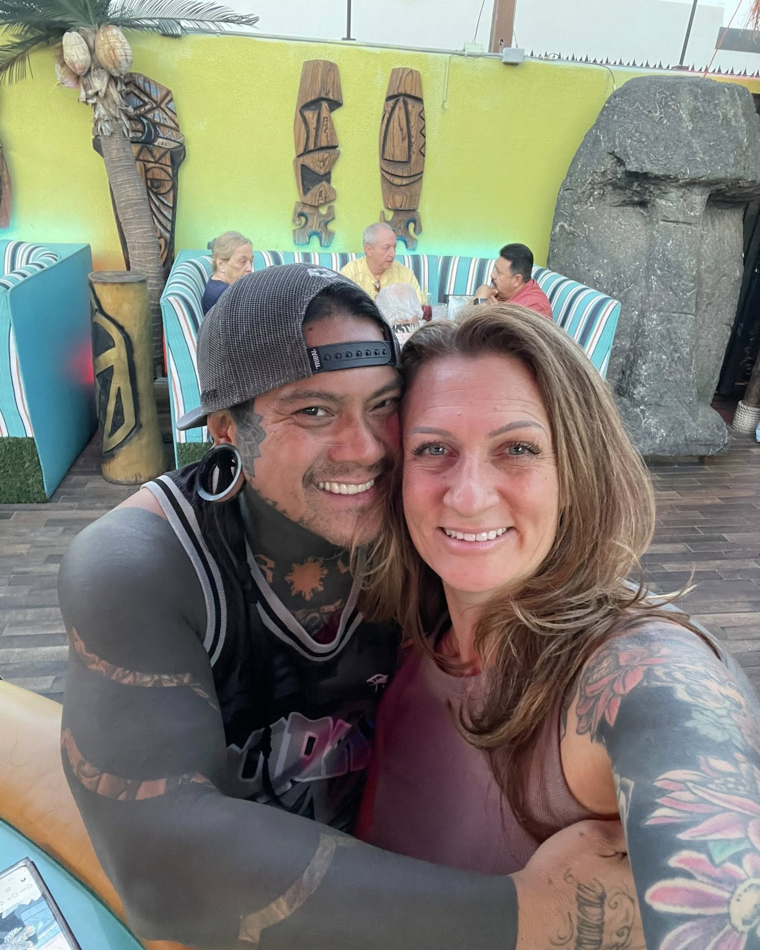 Tattooed couple American traditional tattoo on the torso by Jo'el Acoba