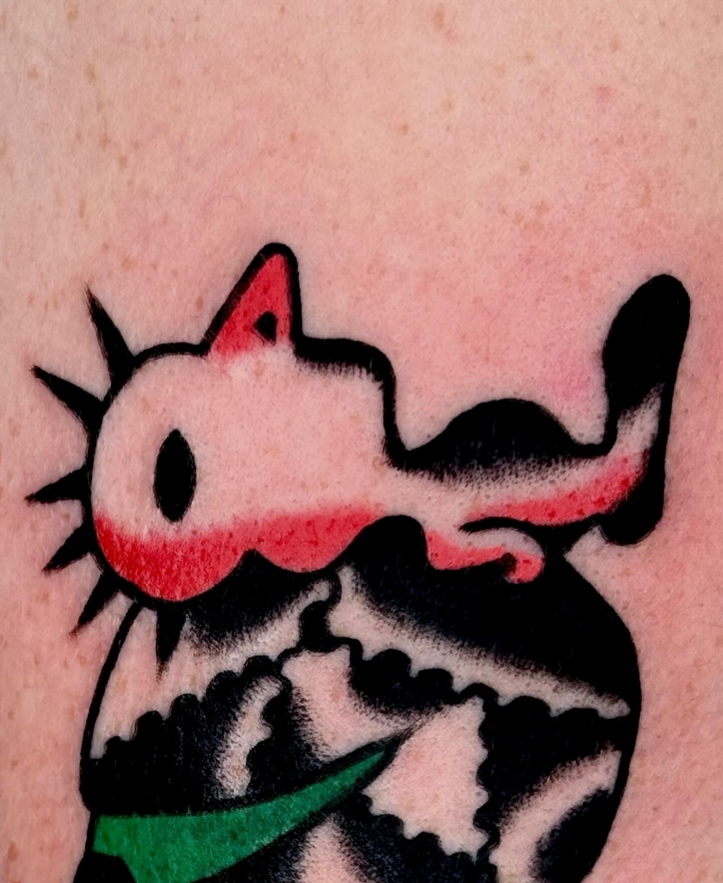 Cat American traditional tattoo on the forearm by JAX