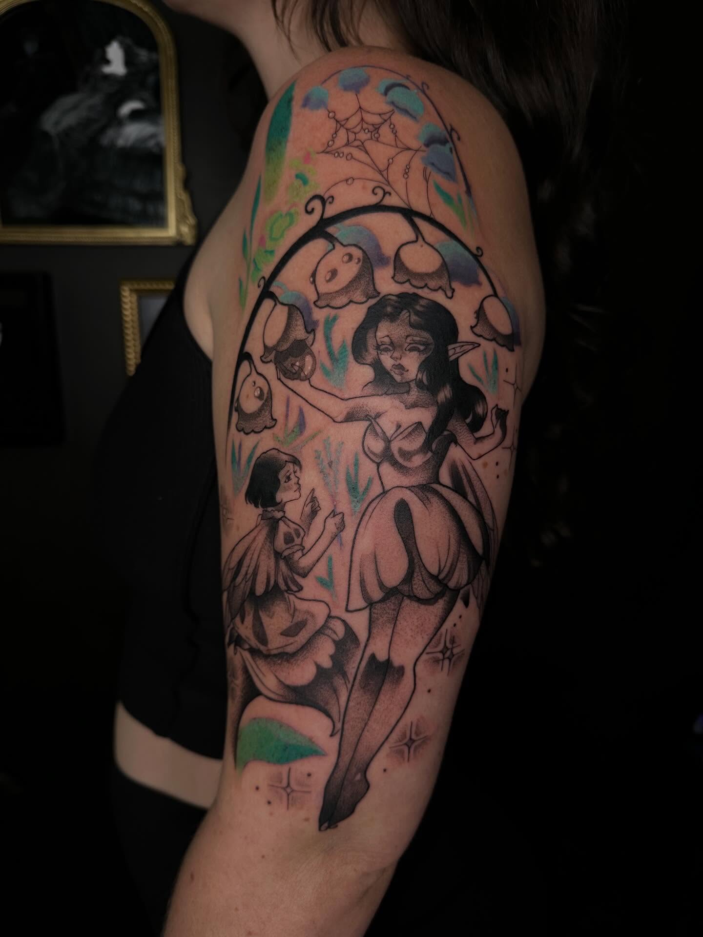 Fairy tale characters illustrative tattoo on the upper arm by 𝔅𝔞𝔱𝔅𝔬𝔫𝔢 🦇Mariah Hernandez