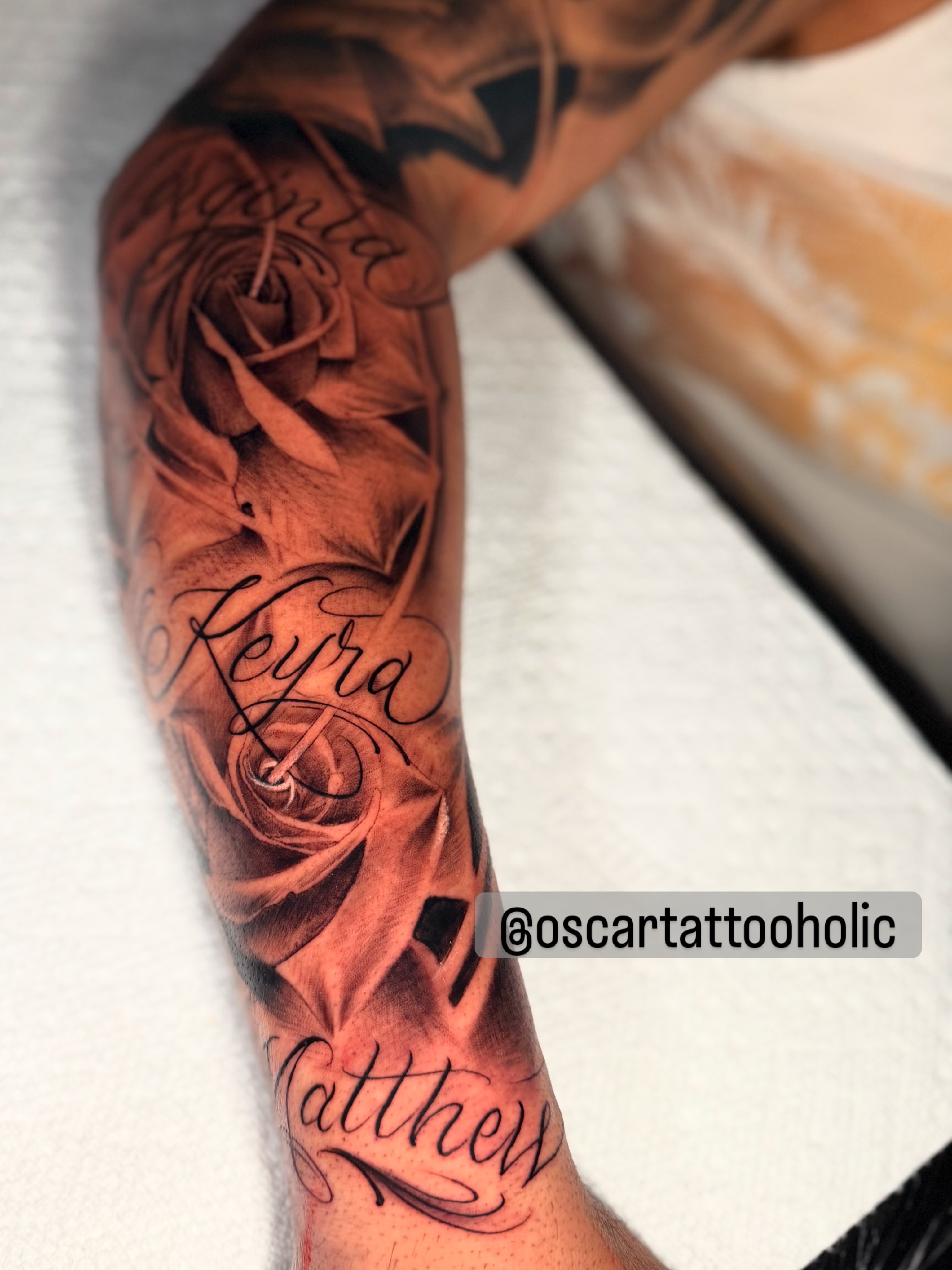 Rose and names realism tattoo on the forearm by Oscar Tattooholic ( REALISM ANIME INK )
