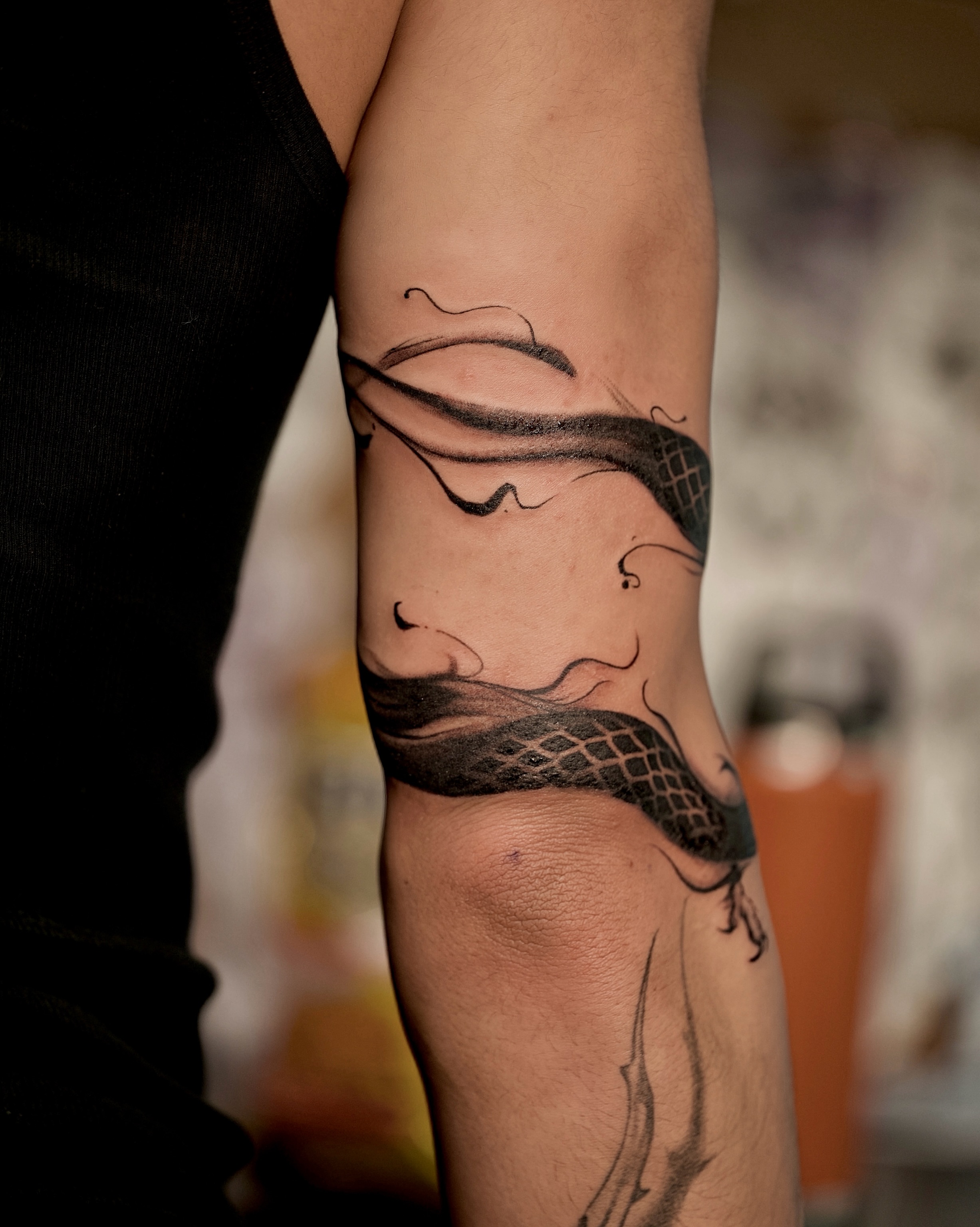 Snake black and grey tattoo on the forearm by Damon_modoink