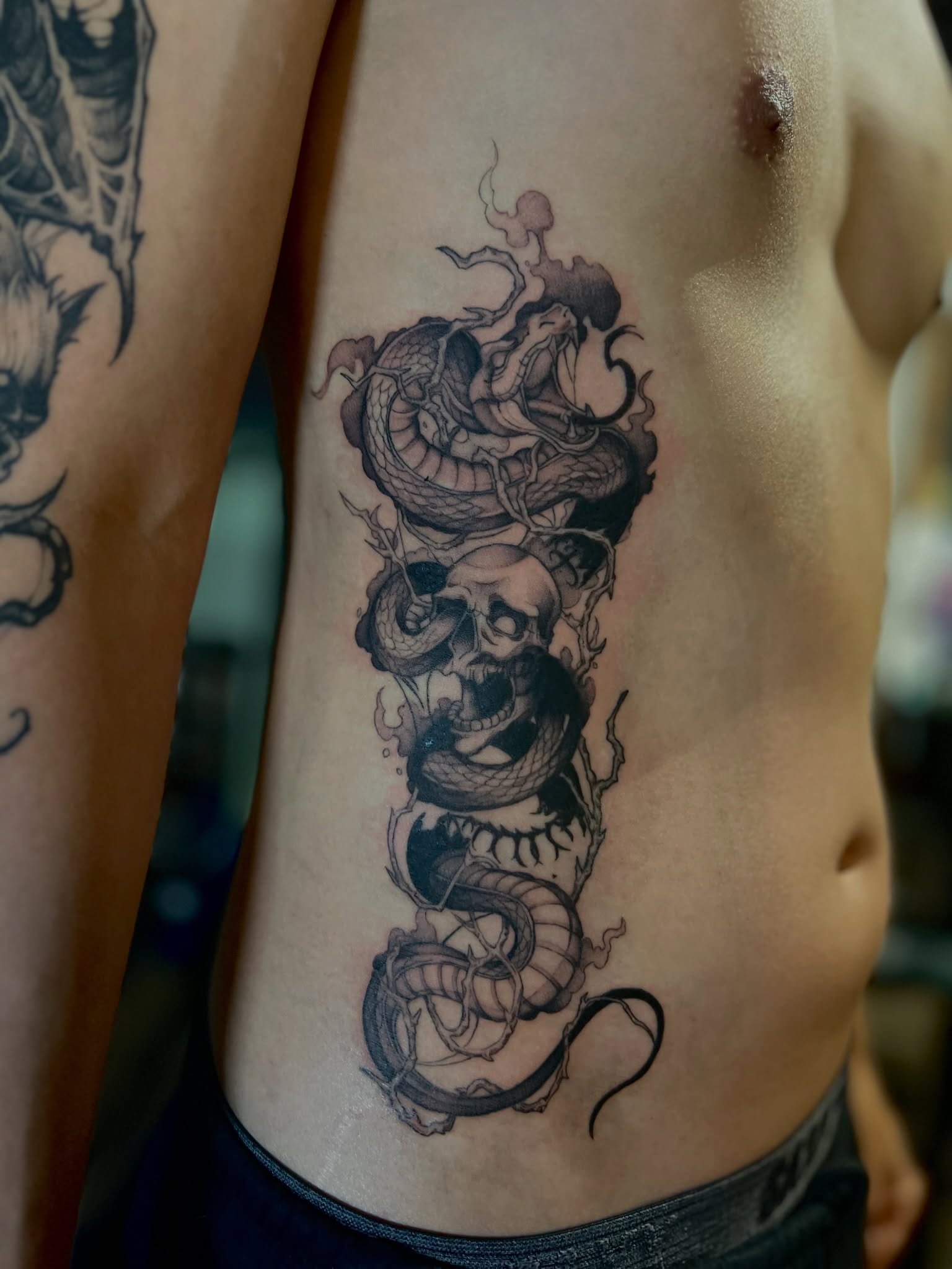 Tattoo by @makoto.tattooarts — black_and_grey, realism