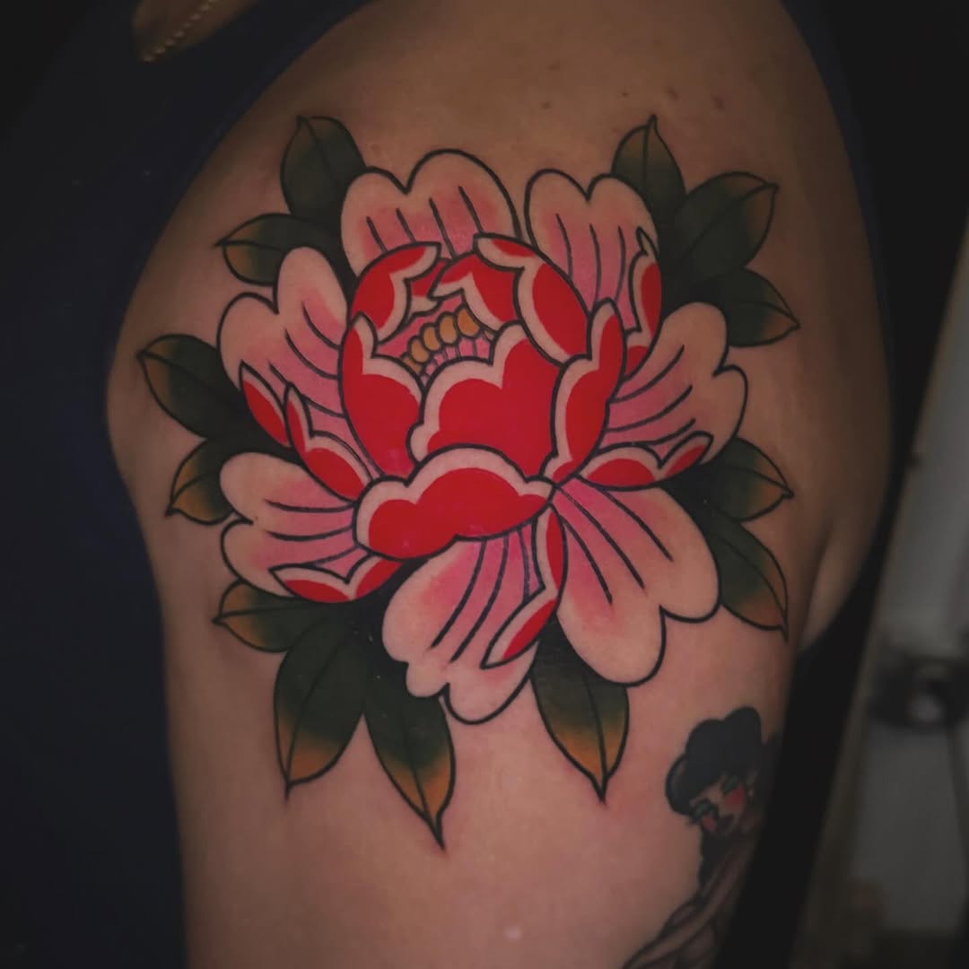 Peony flower neo-traditional tattoo on the shoulder by Nikki Bee