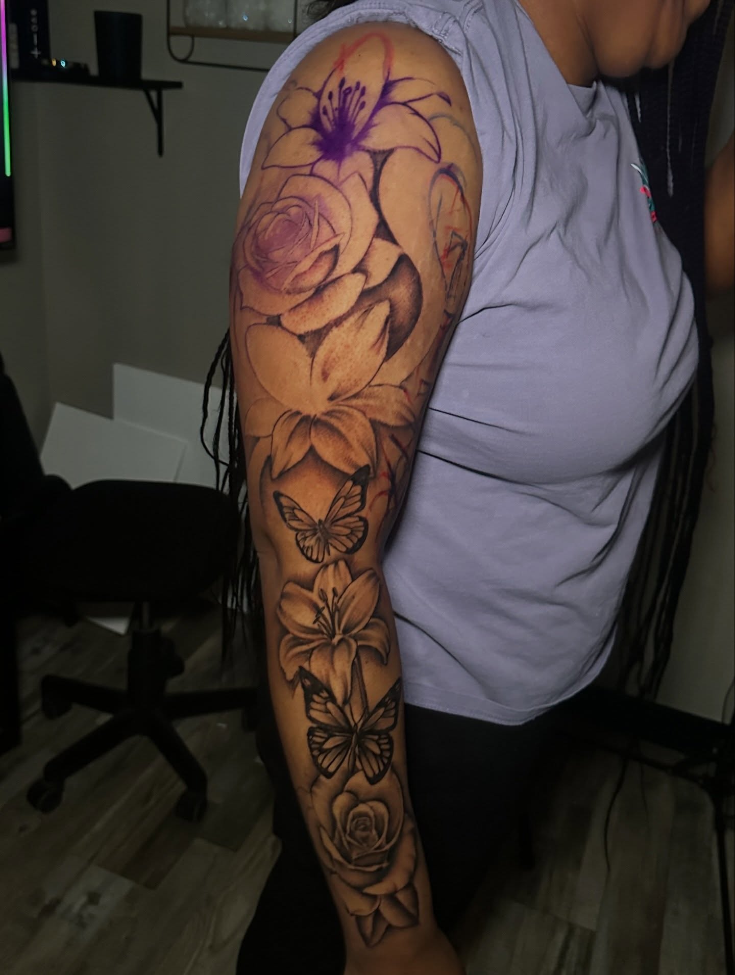 Flowers and butterflies realism tattoo on the forearm by @tattedbytuck