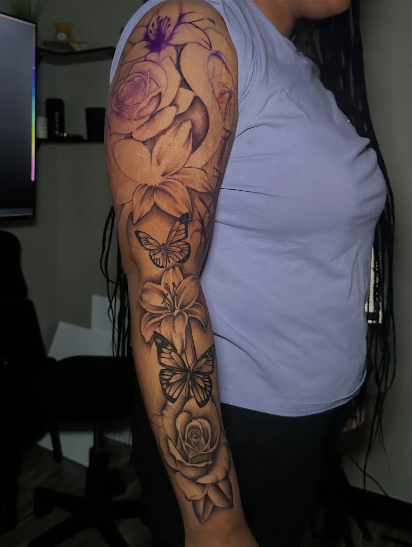 Flowers and butterflies realism tattoo on the forearm by @tattedbytuck