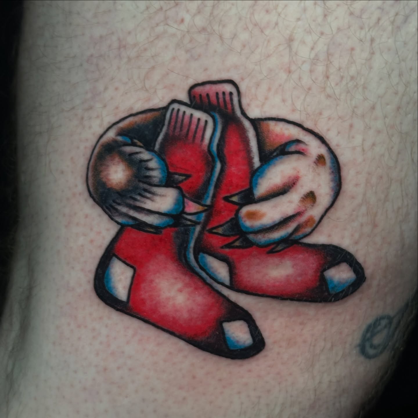 Boxing gloves American traditional tattoo on the forearm by Providence Tattooer