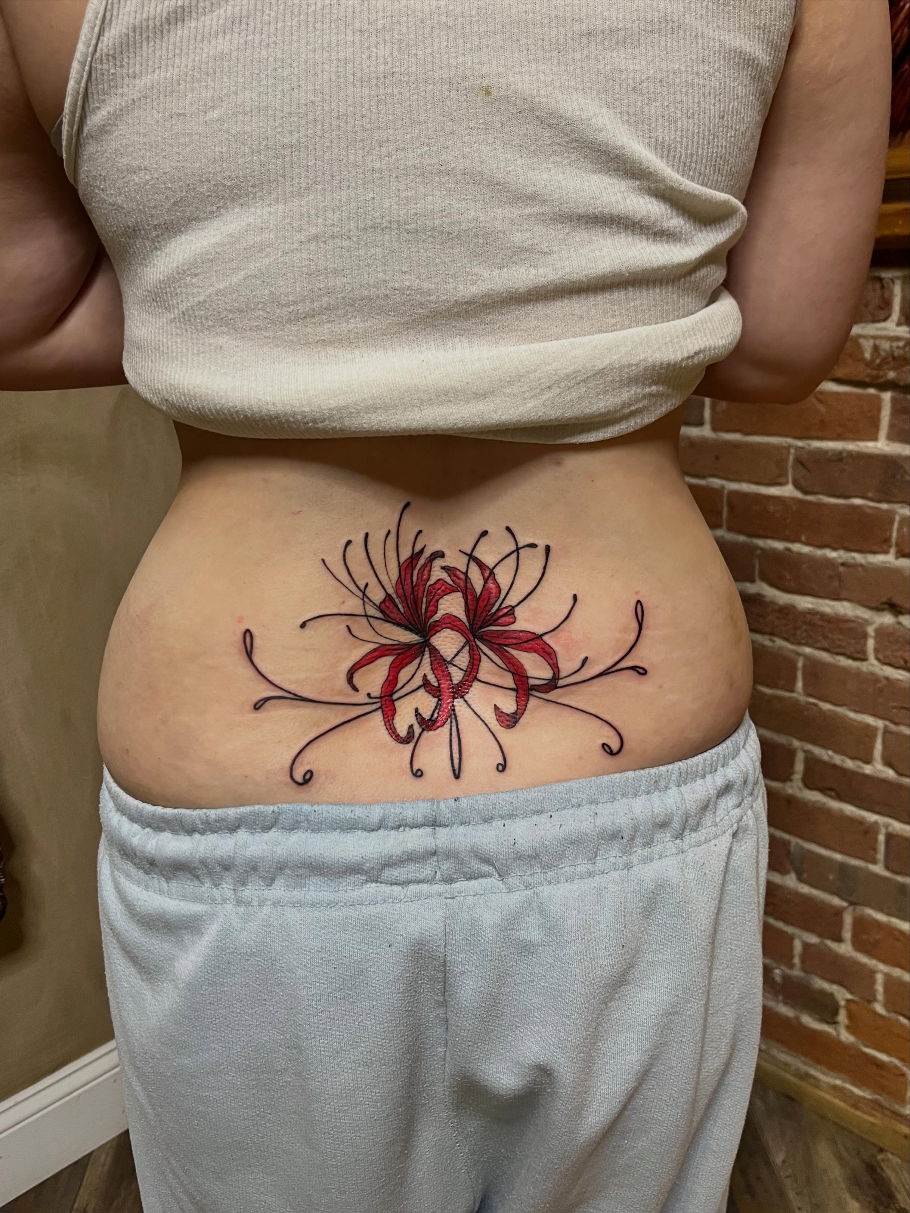 Chrysanthemum geometric tattoo on the torso by Tattoo Artist, Kansas City, Missouri