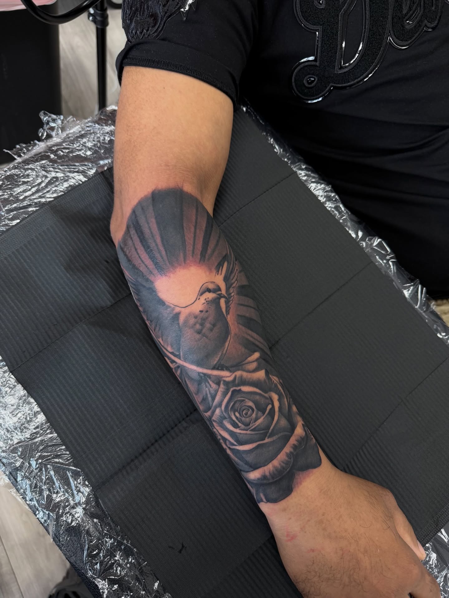 Sun and rose realism tattoo on the forearm by Michigan📍 Day Sessions $850, Wayne, Michigan