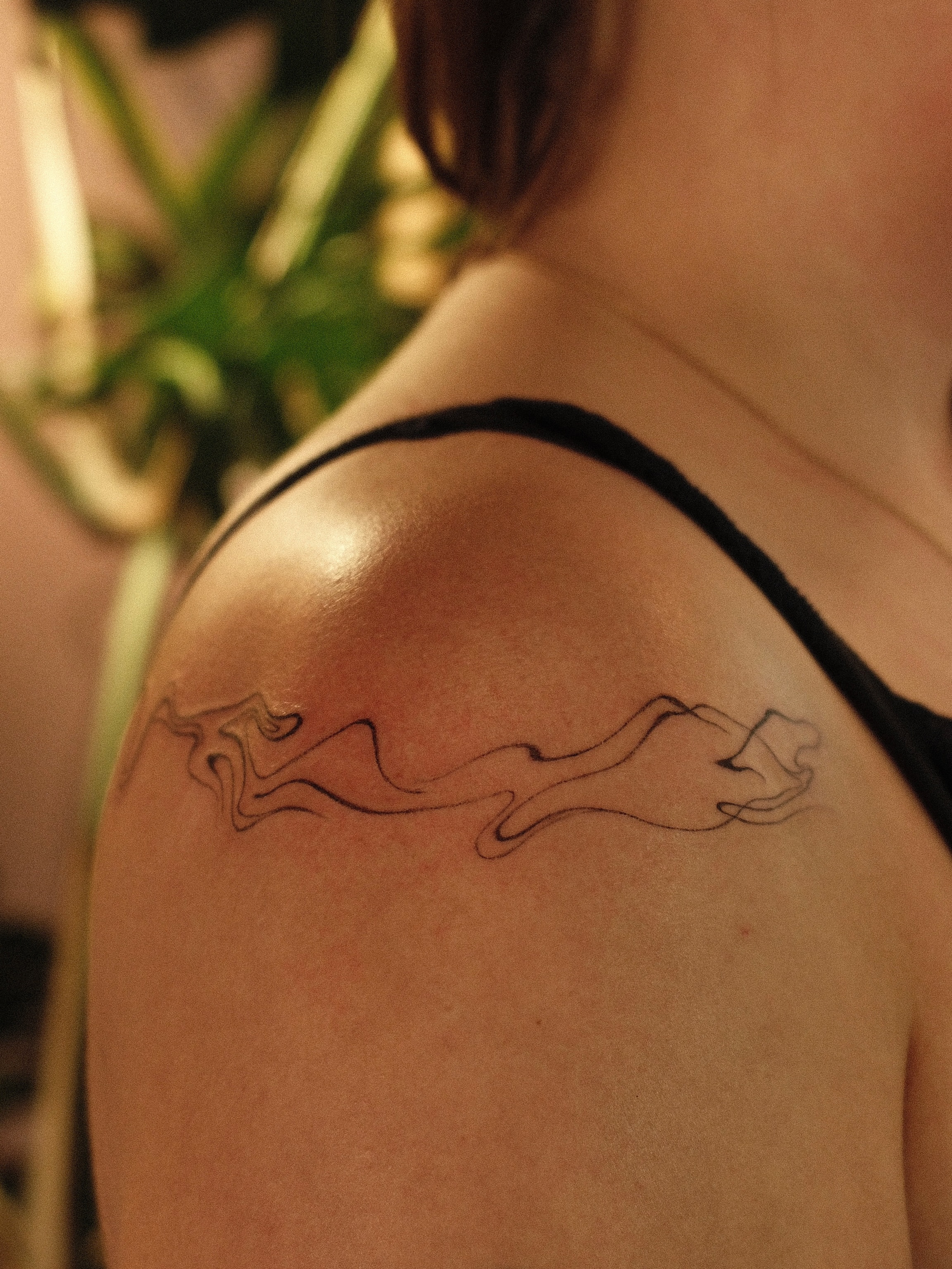 Abstract flame fine line tattoo on the shoulder by v?