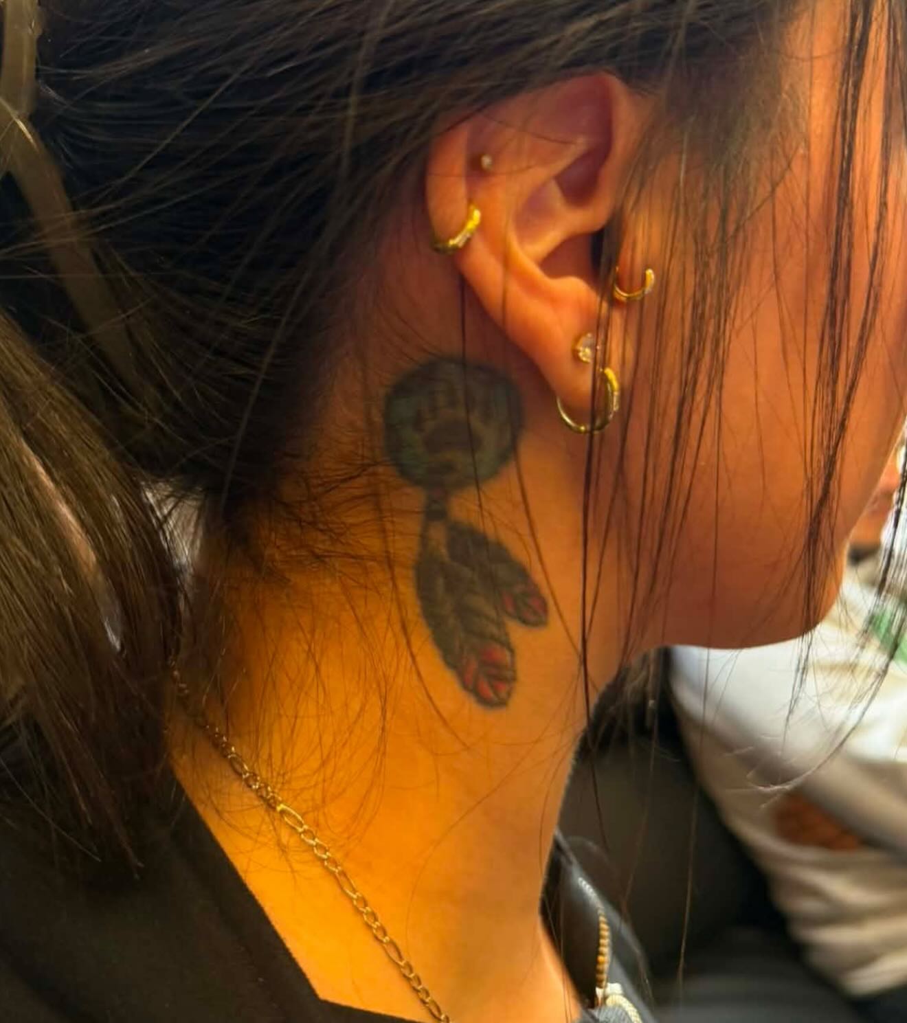 Hand American traditional tattoo on the neck by Yvonne
