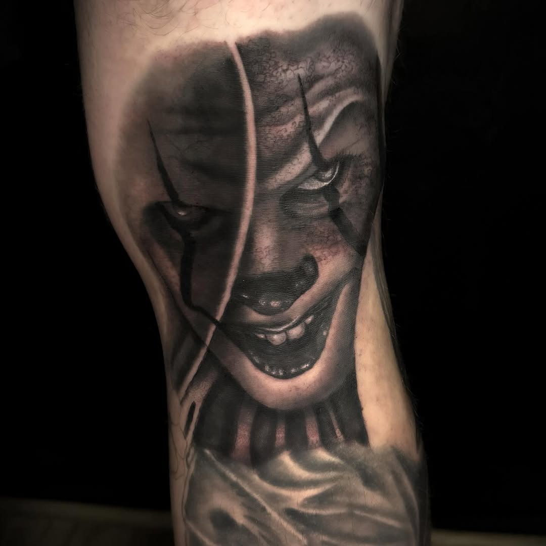 Creepy clown face realism tattoo on the forearm by Jacie Aasen-Lupino