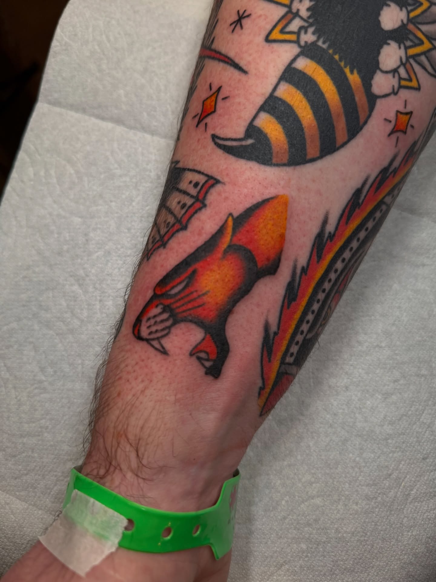 Cat and rocket American traditional tattoo on the forearm by Tyler Brown, San Diego, California