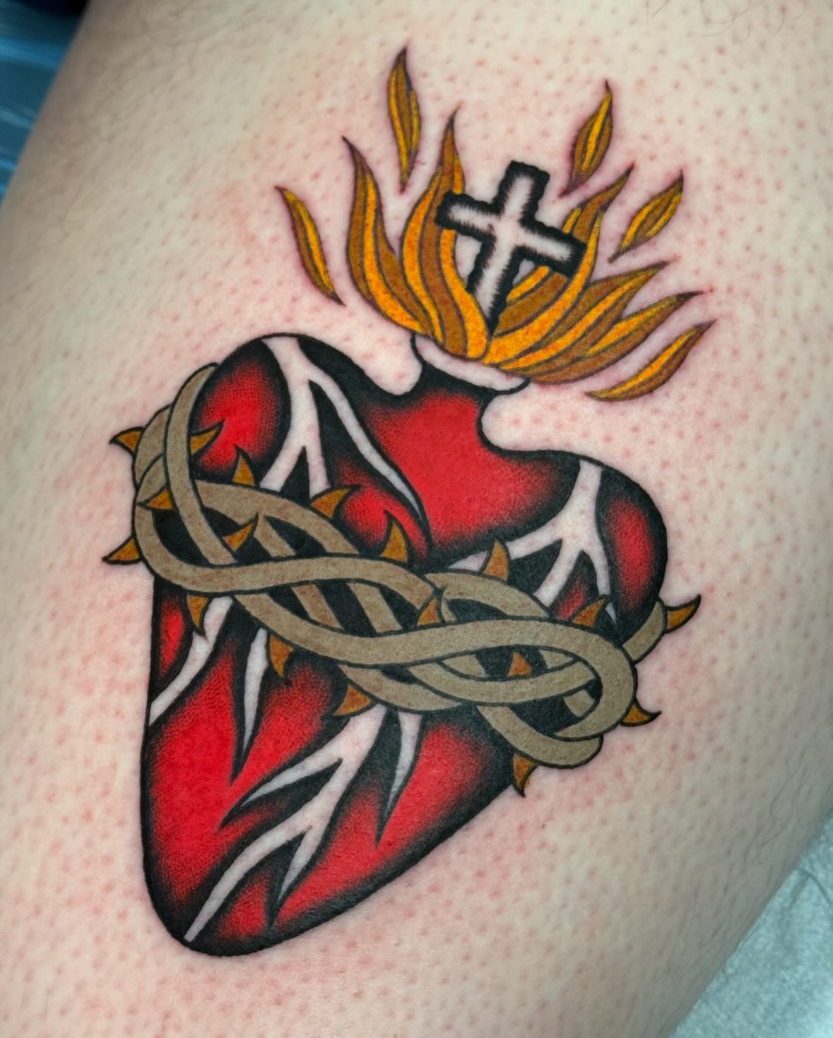 Heart with crown American traditional tattoo on the thigh by Collin Rigsby, Minneapolis, Minnesota