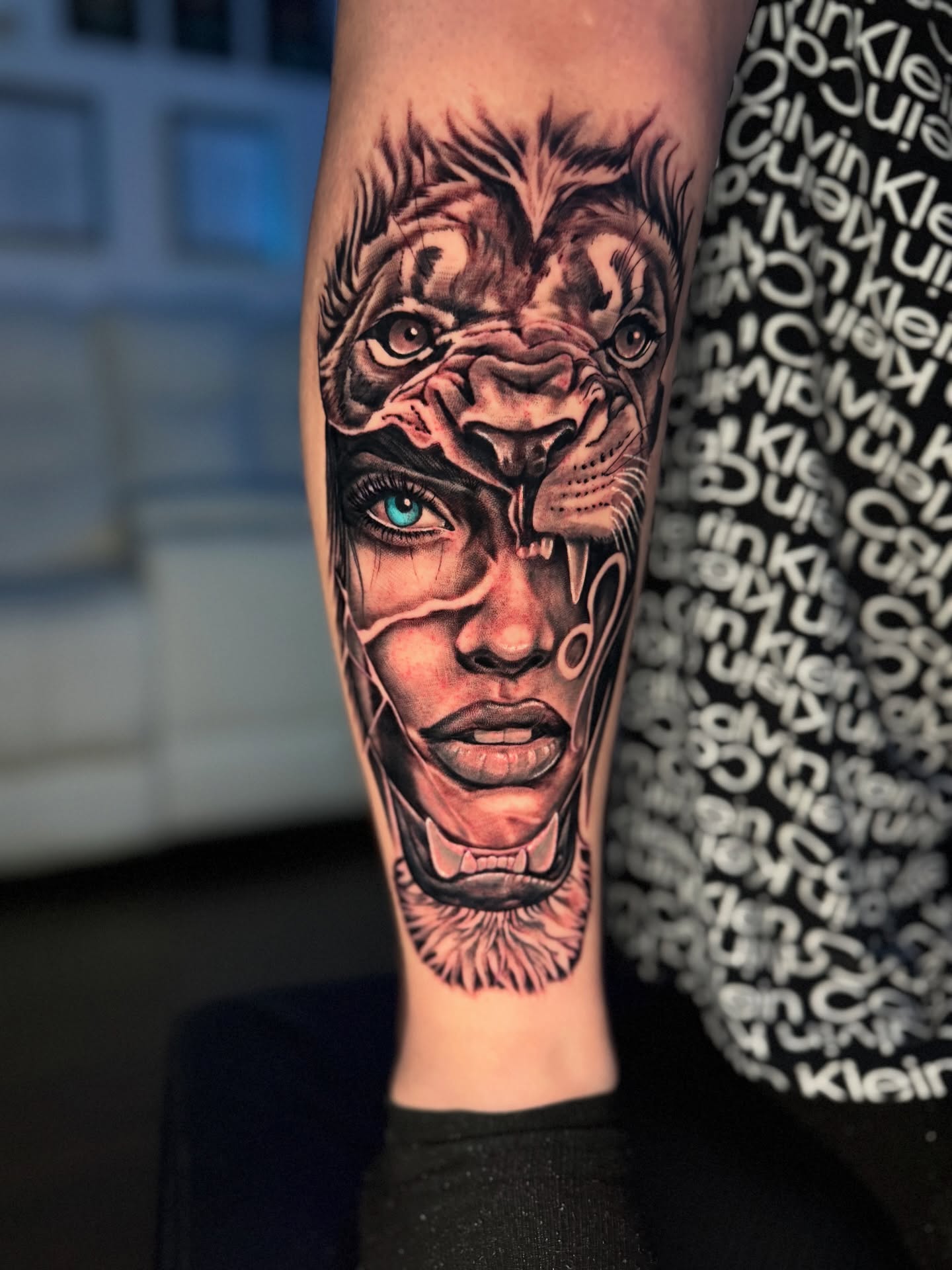 Woman with tiger realism tattoo on the forearm by Quentin Stevenson, Slidell, Louisiana