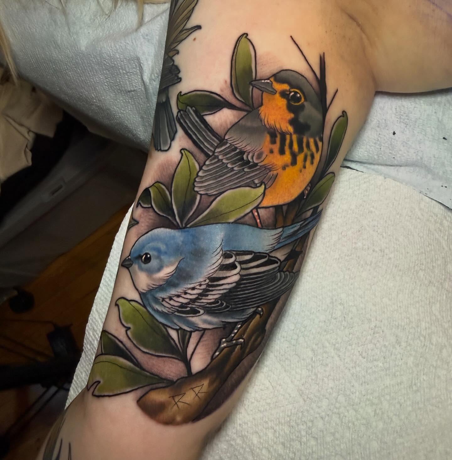 Birds and leaves realism tattoo on the forearm by Kyle Behr